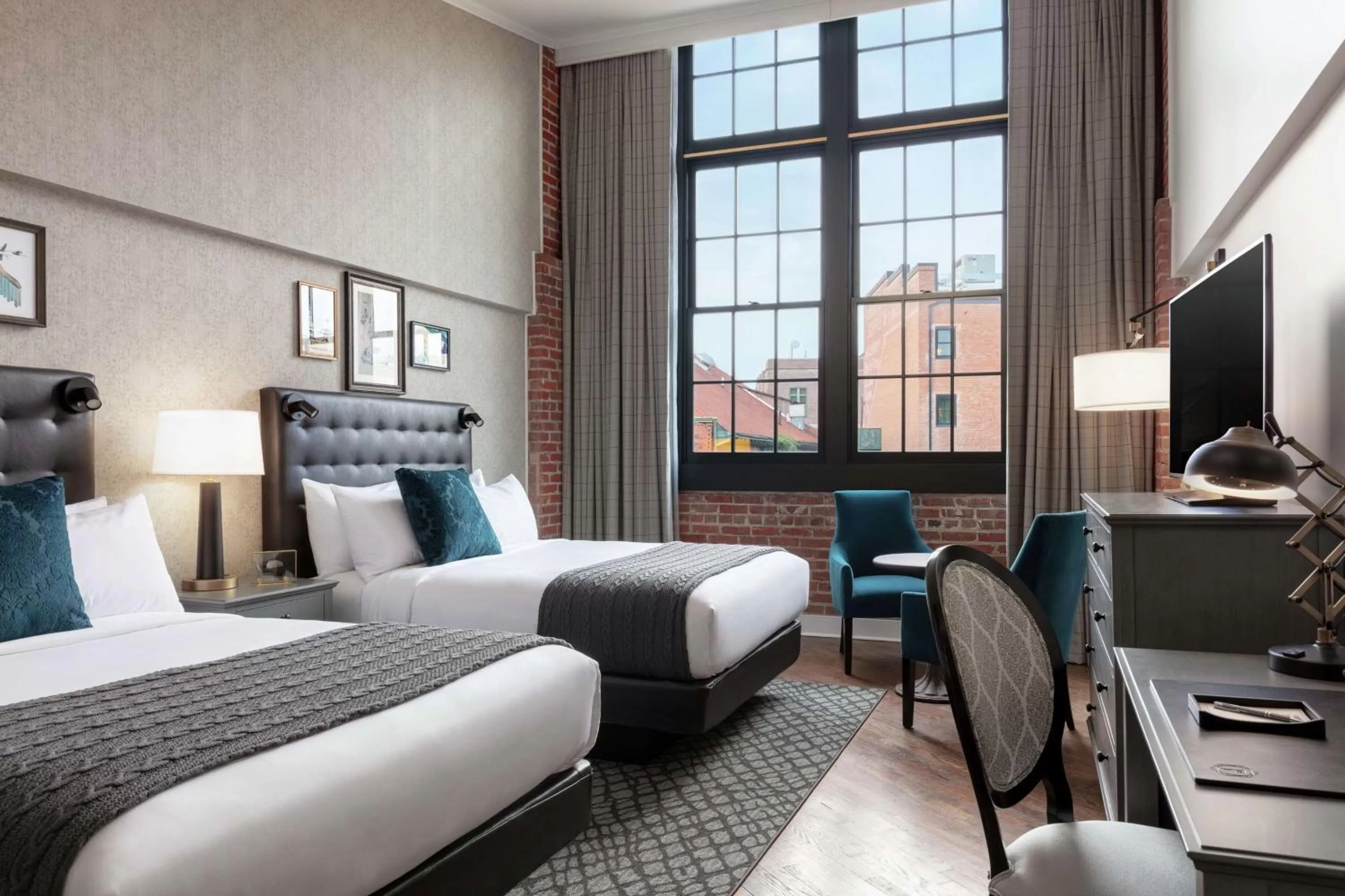 Queen Room with Two Queen Beds in Foundry Hotel Asheville, Curio Collection By Hilton