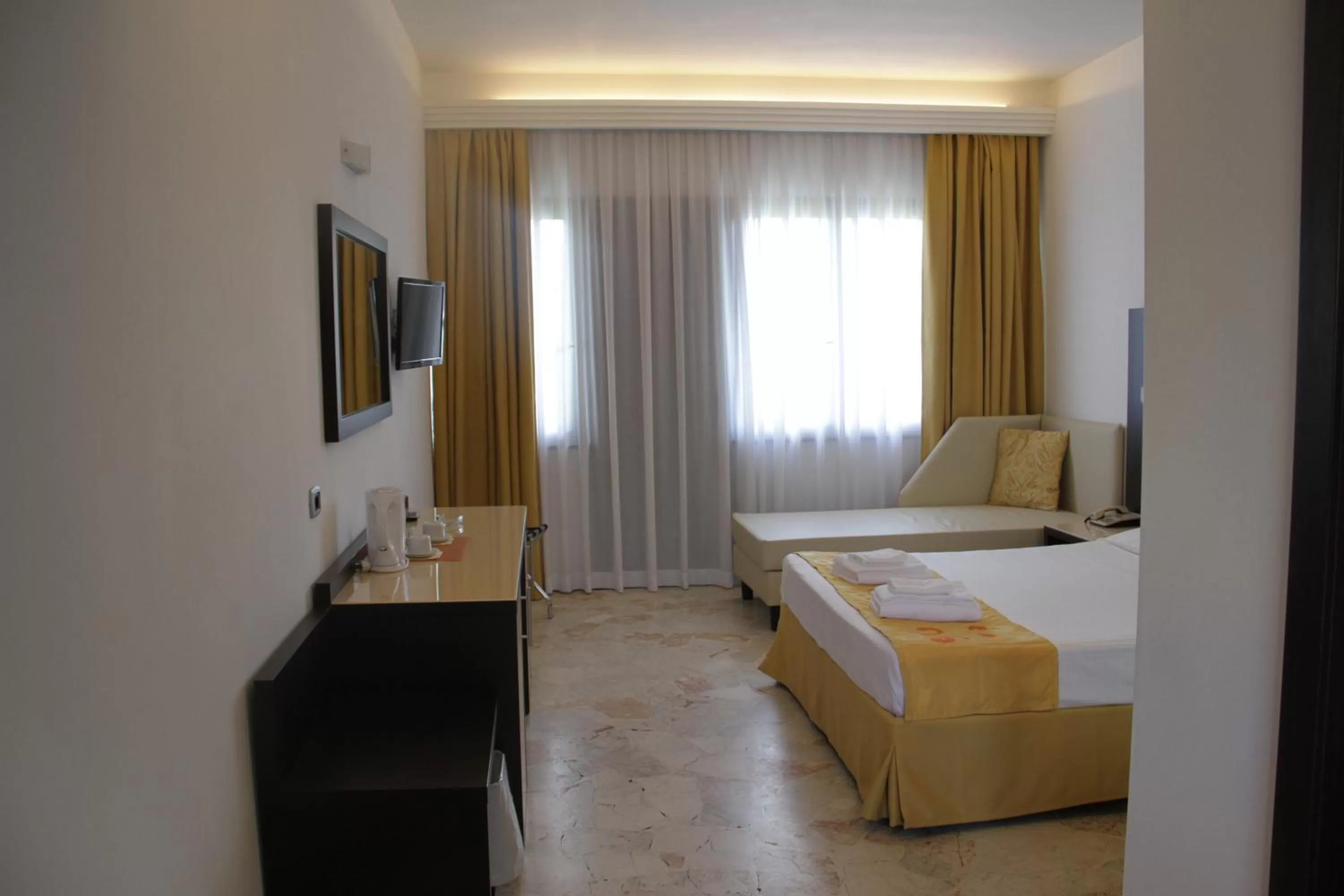 Triple Room with Garden View in Hotel Boomerang