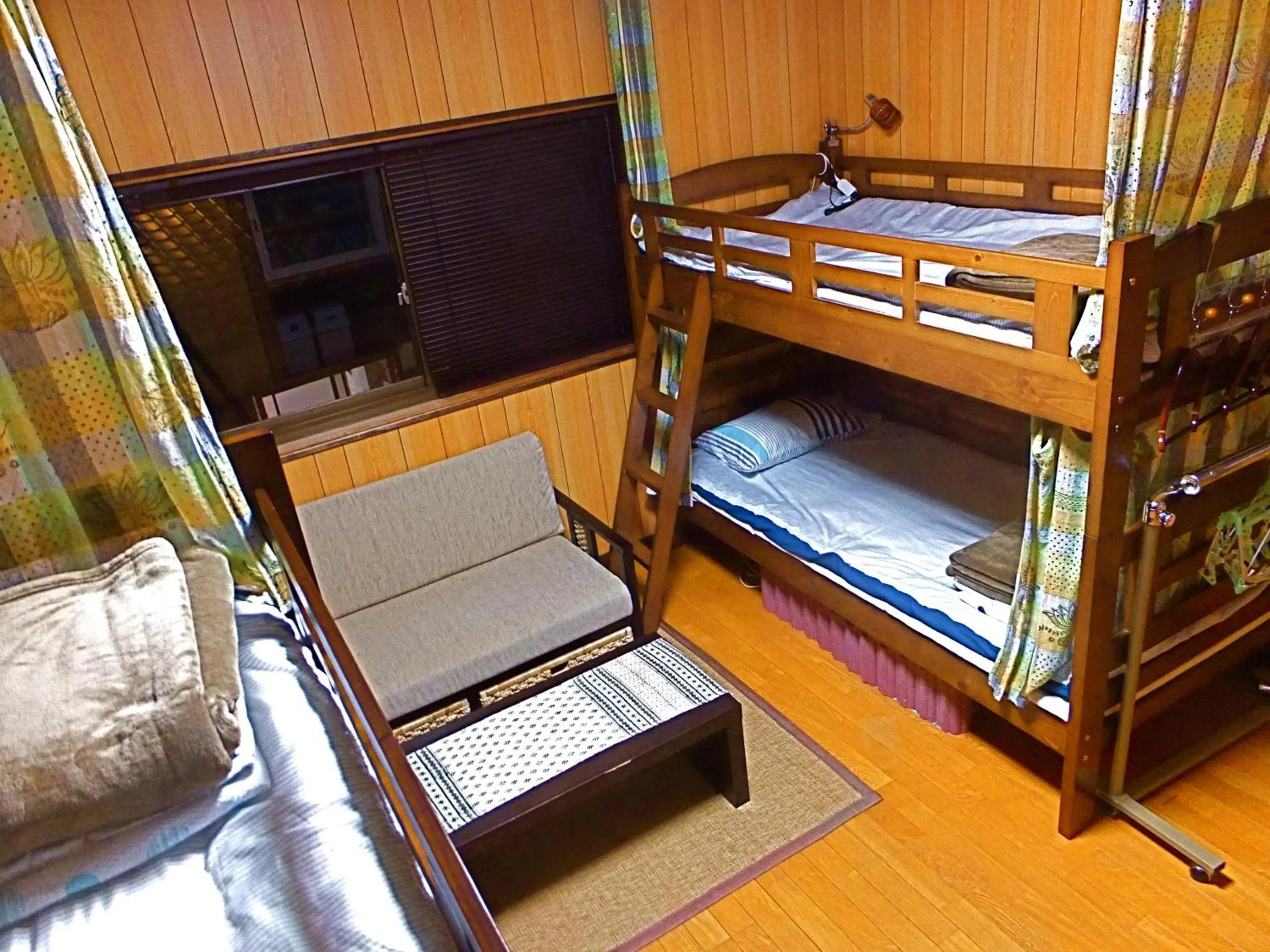 Bed in 8-Bed Dormitory Room in Aoshima Guesthouse Hooju