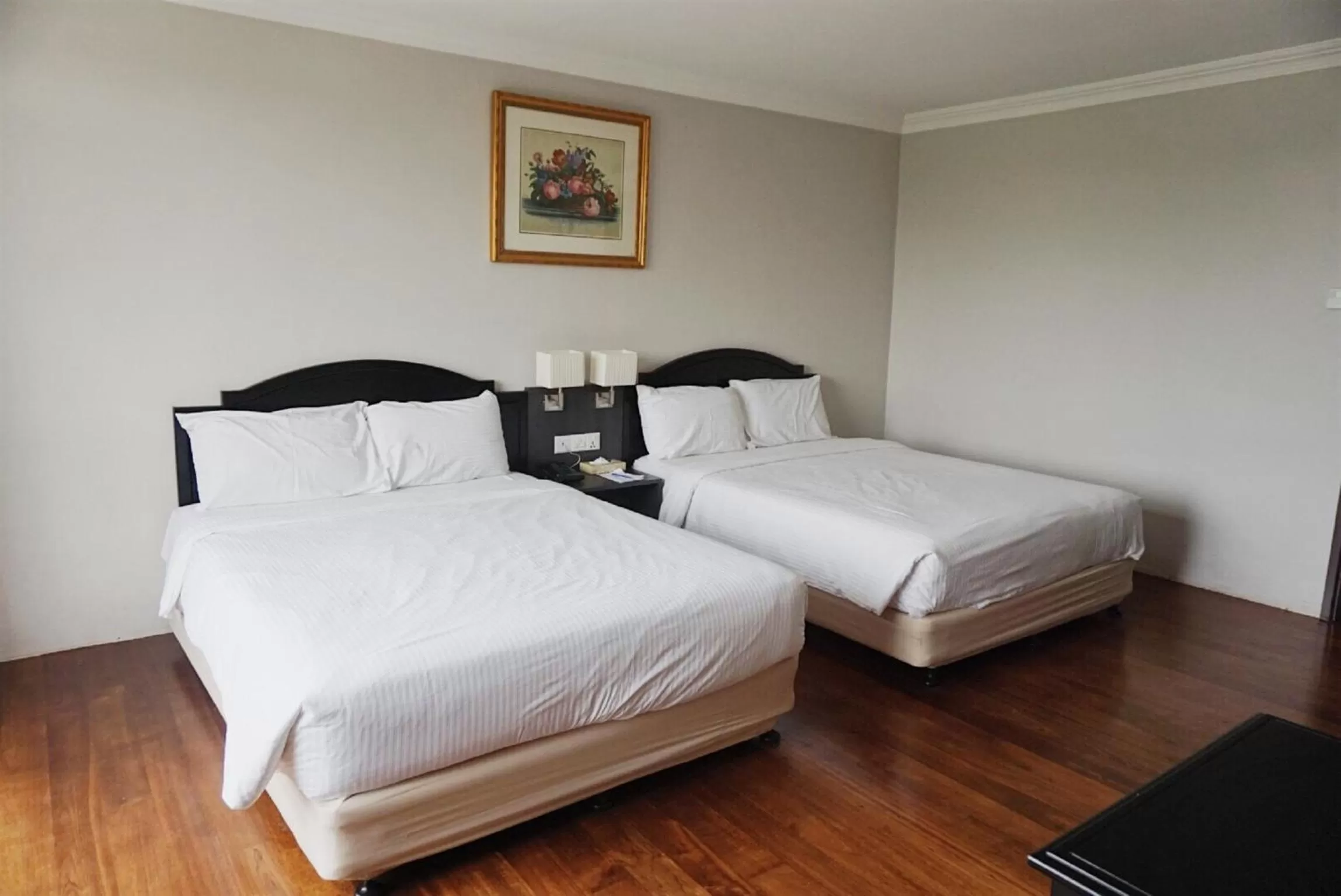 Deluxe Quadruple Room in Kingwood Hotel Kuching