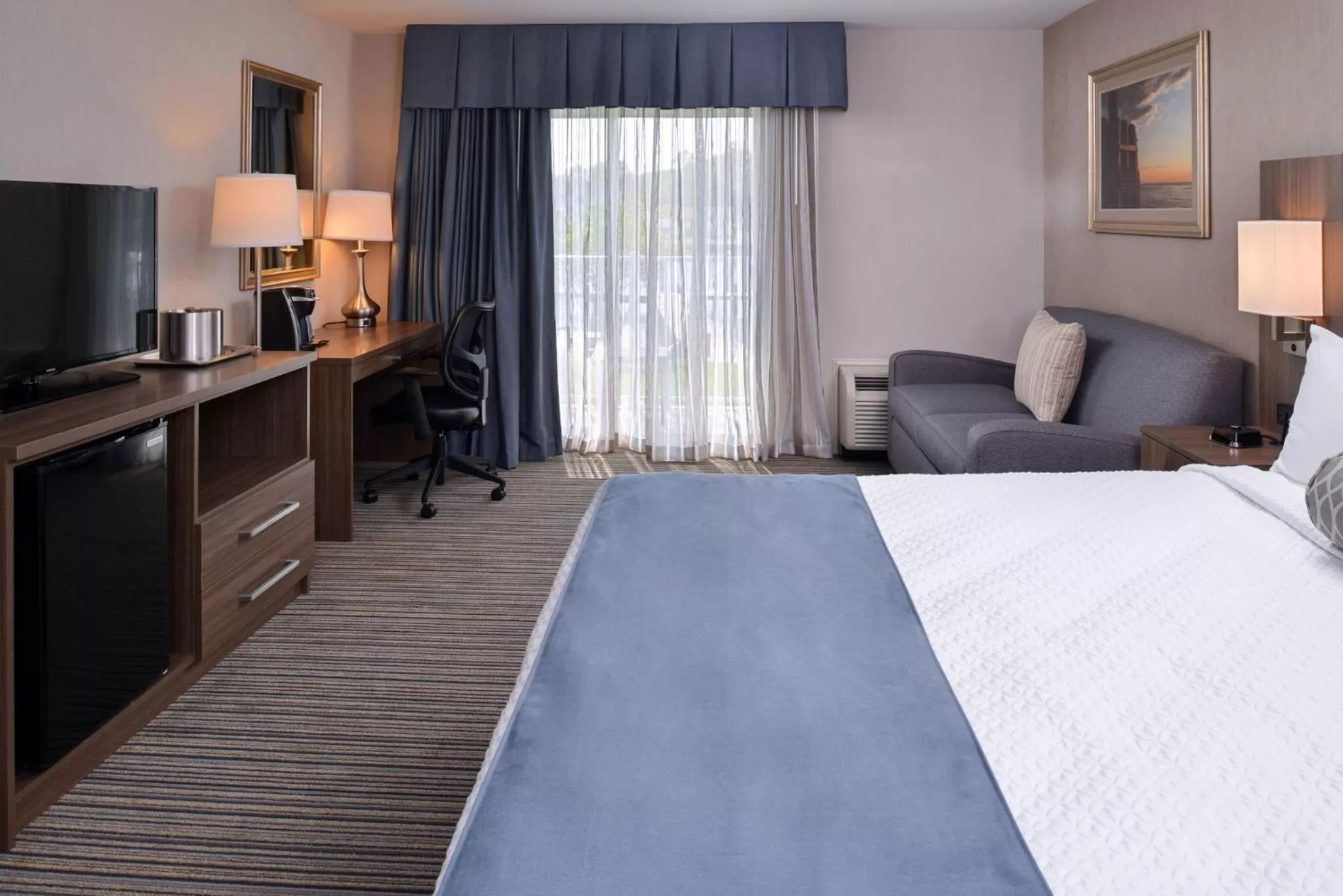 Deluxe King Room with Balcony in Anchored Inn at Hidden Harbor