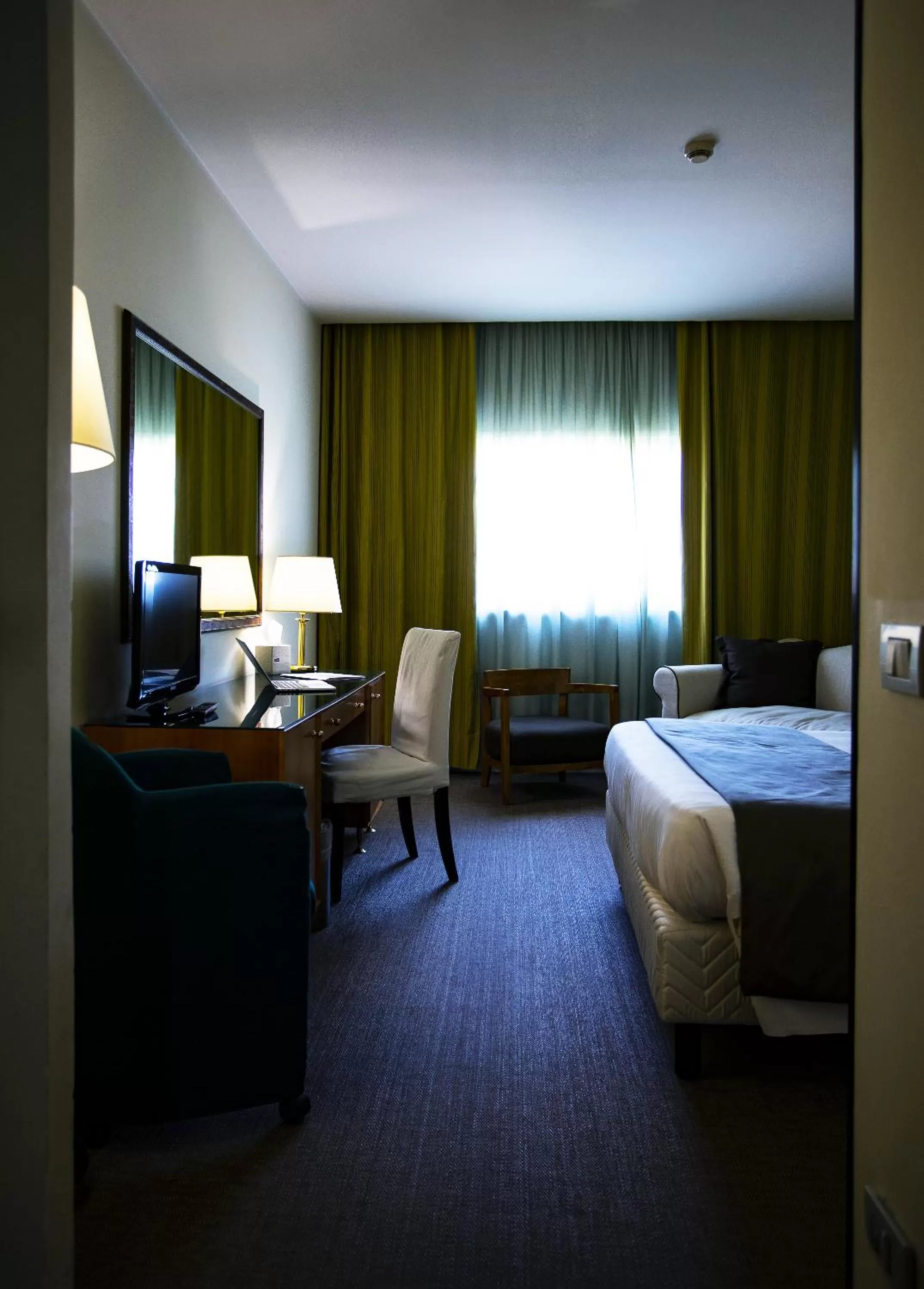 Bed in BV Hotel Oly