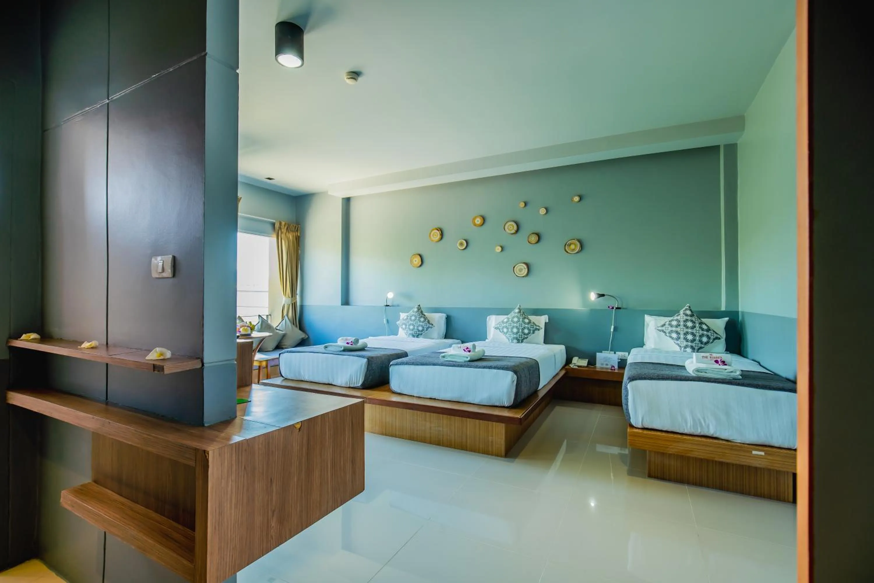 Deluxe Triple Room in The Rubber Hotel Phuket