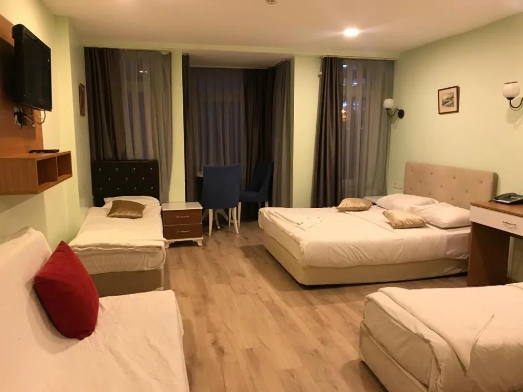 Quadruple Room in Historial Hotel