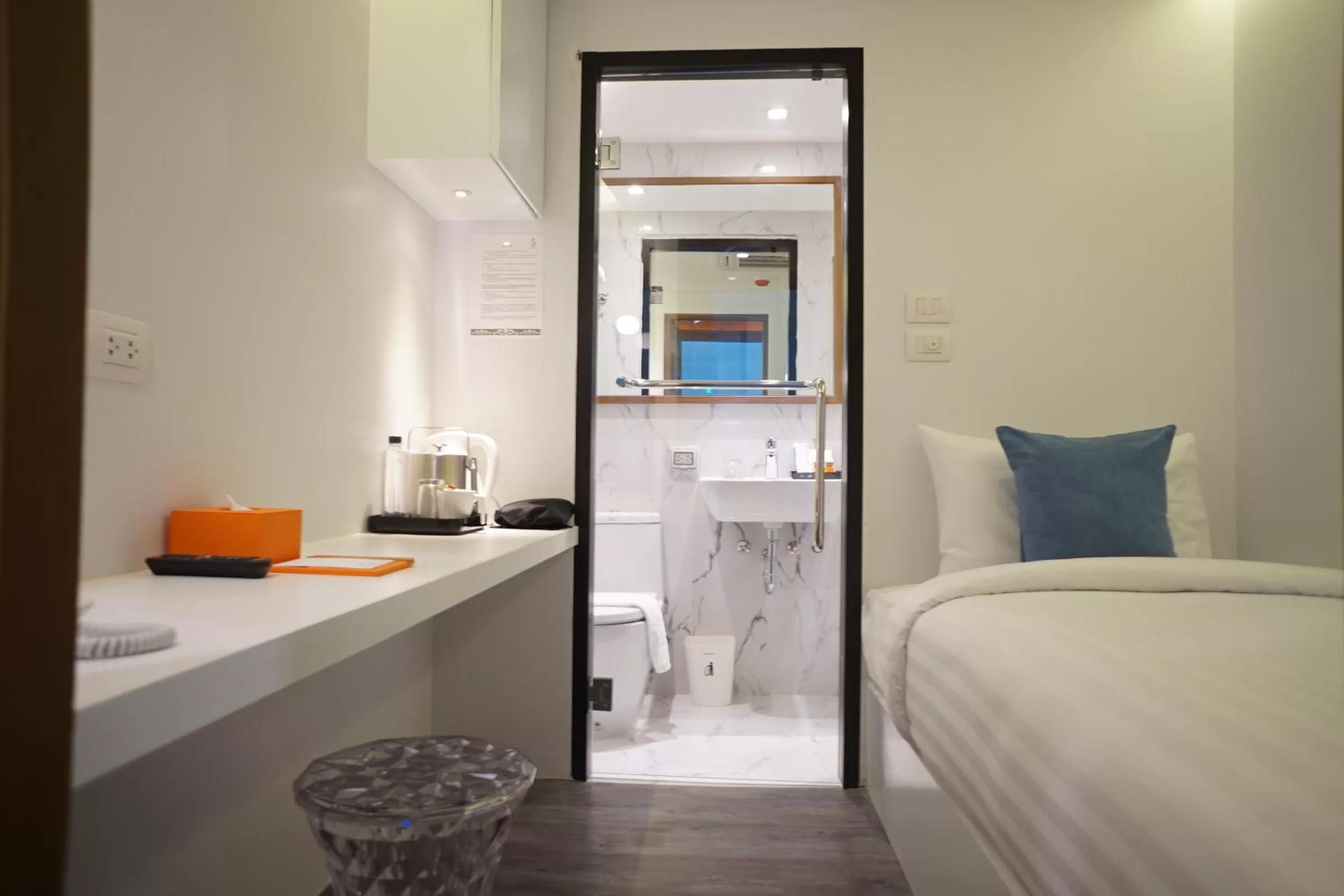 Bed in S Box Sukhumvit Hotel