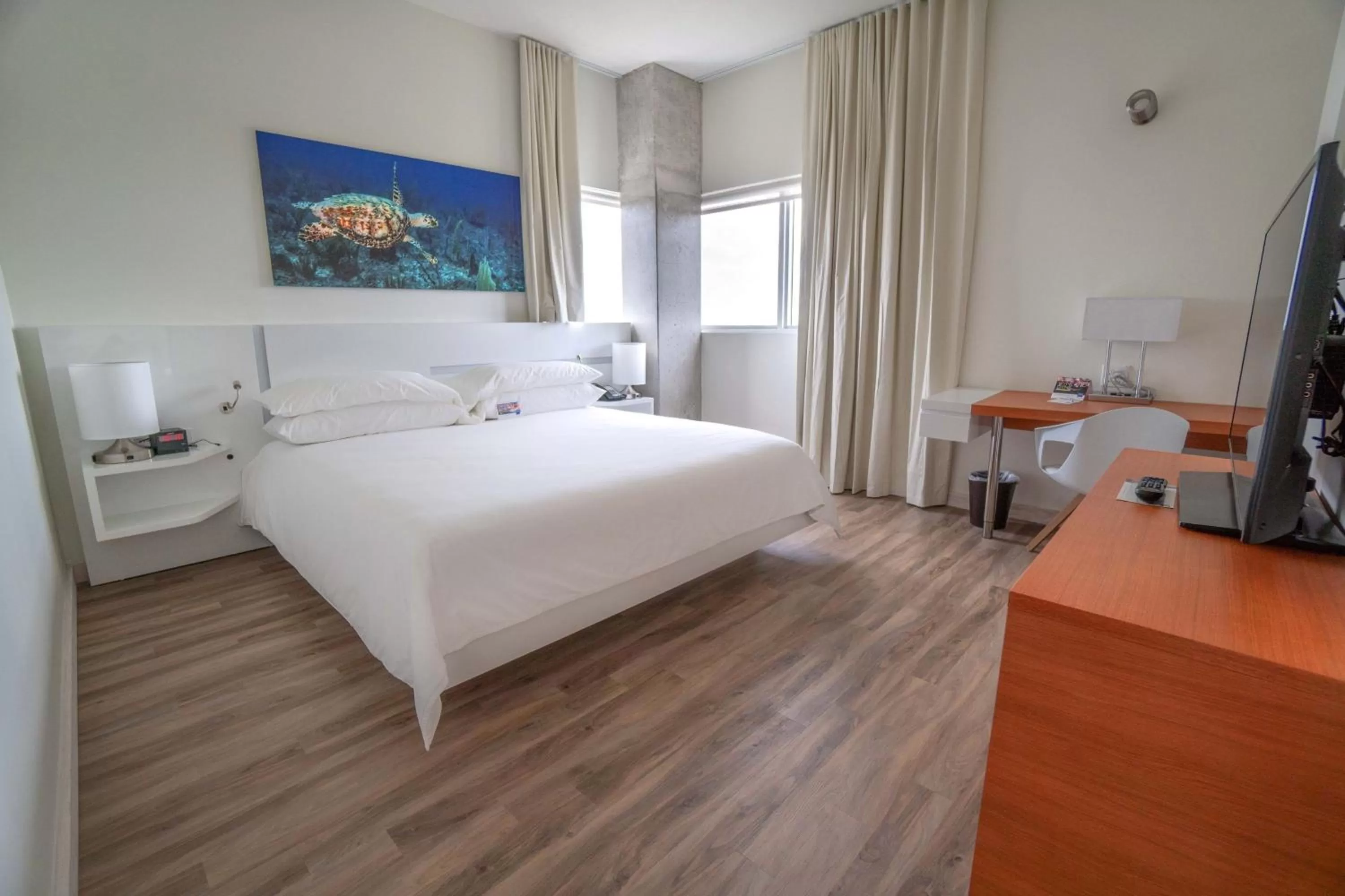 Standard King Room with Mobility Accessible Roll-In Shower in Maritime Hotel Fort Lauderdale Airport & Cruiseport