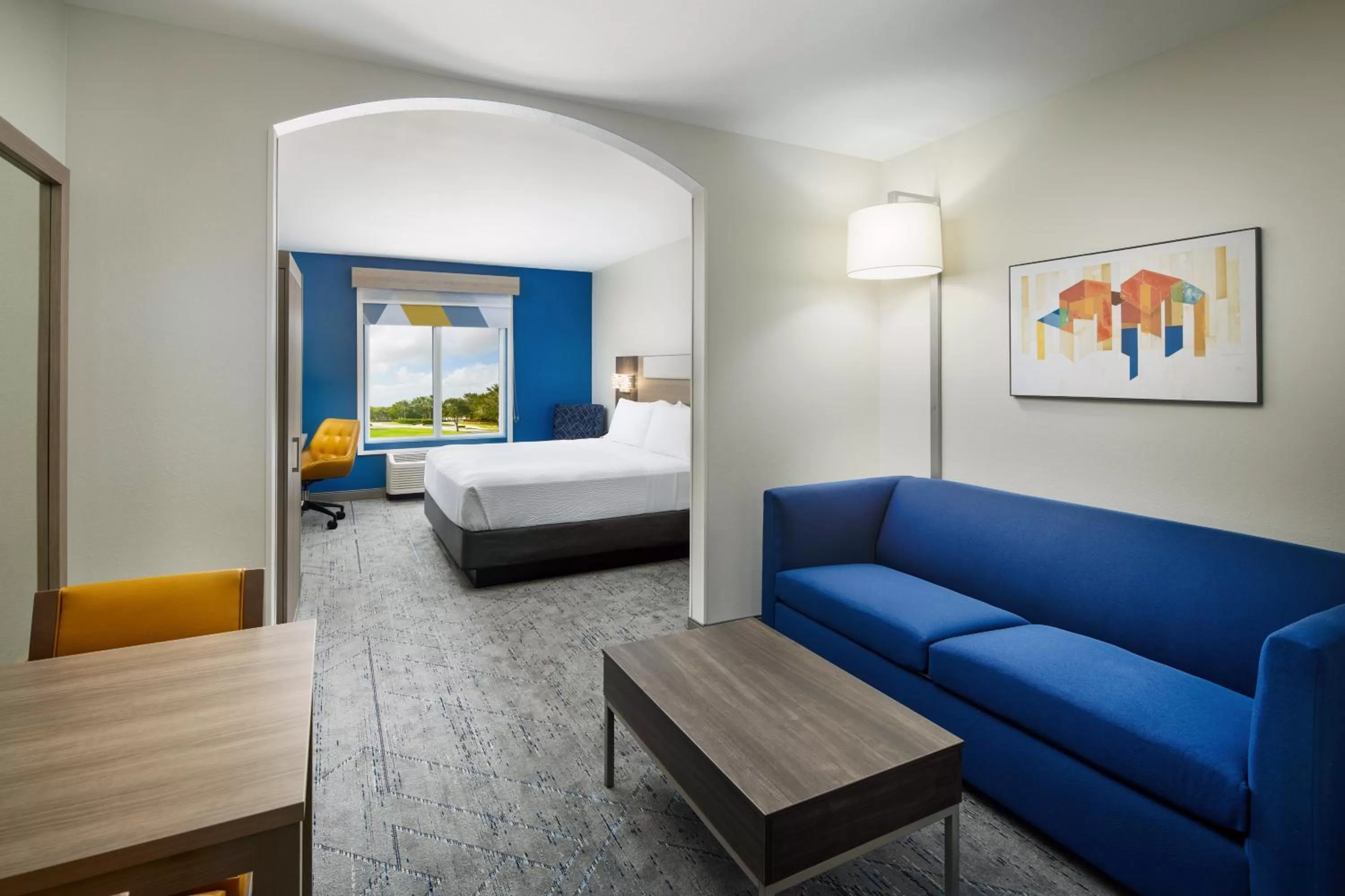 King Suite with Sofa Bed and Tub - Mobility and Hearing Access in Holiday Inn Express Hotel & Suites Port St. Lucie West by IHG