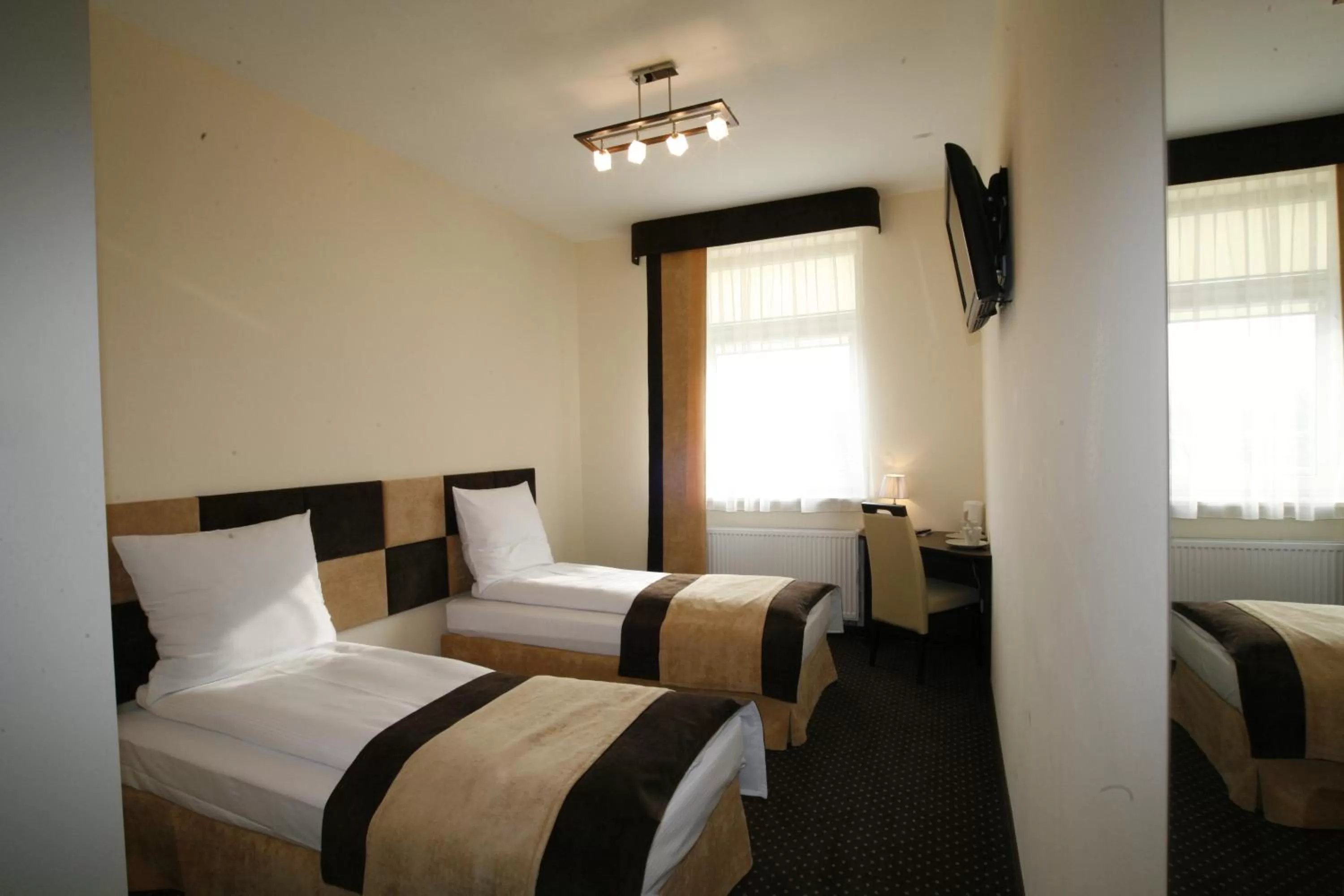 Twin Room in Boutique Hotel's I Milionowa