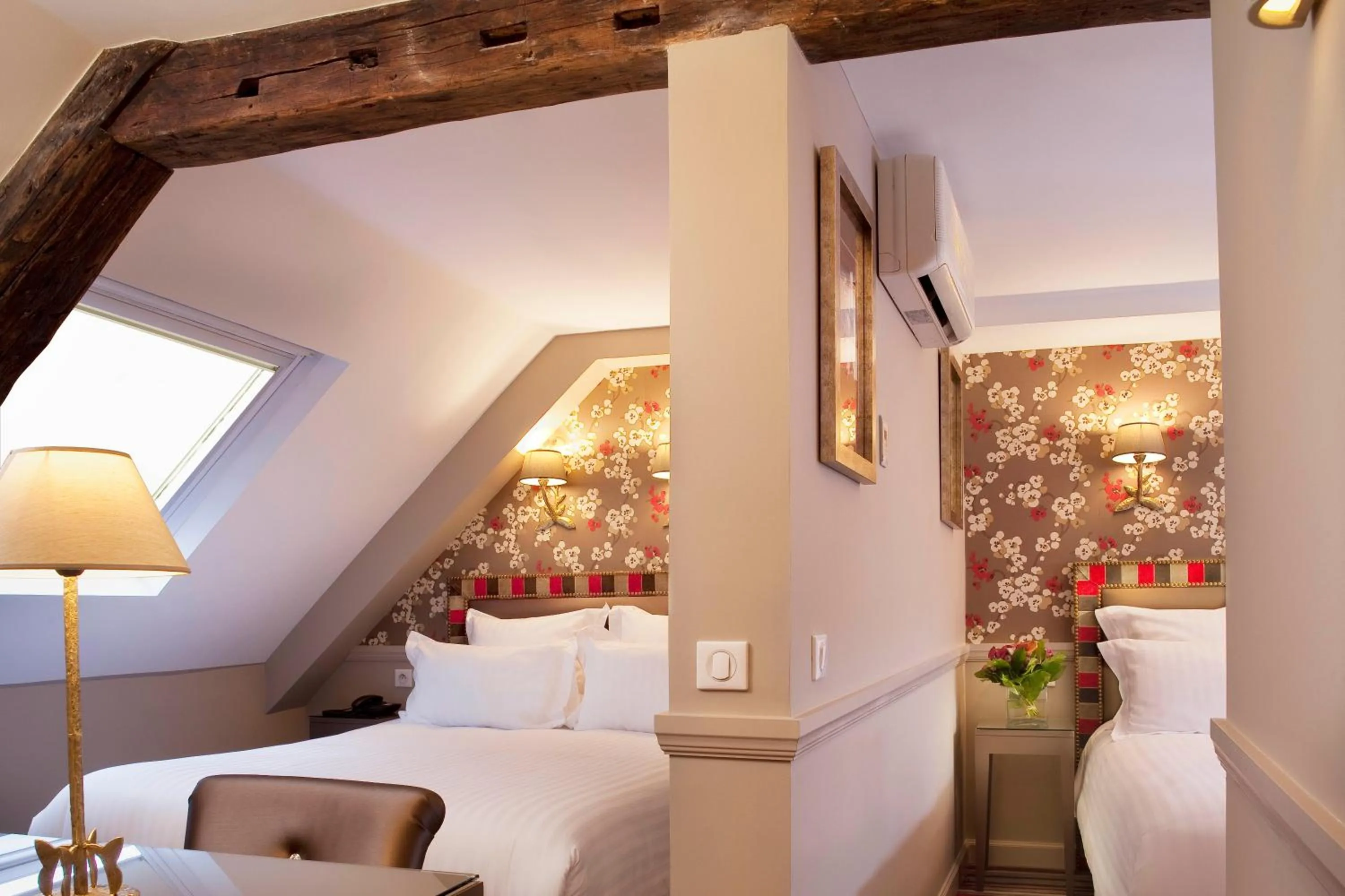 Quadruple Room - Attic in Hôtel des Comédies
