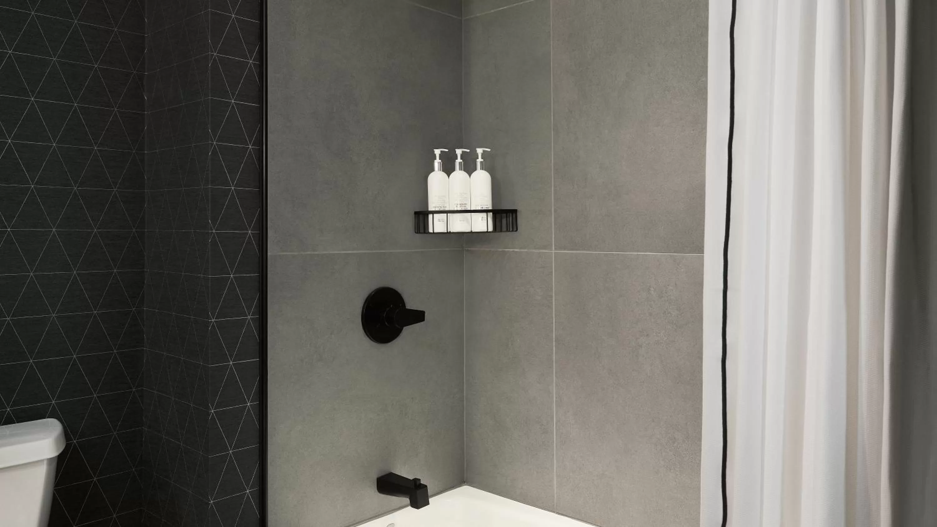 Essential Queen Room with Two Queen Beds and Courtyard View in Kimpton Marlowe by IHG