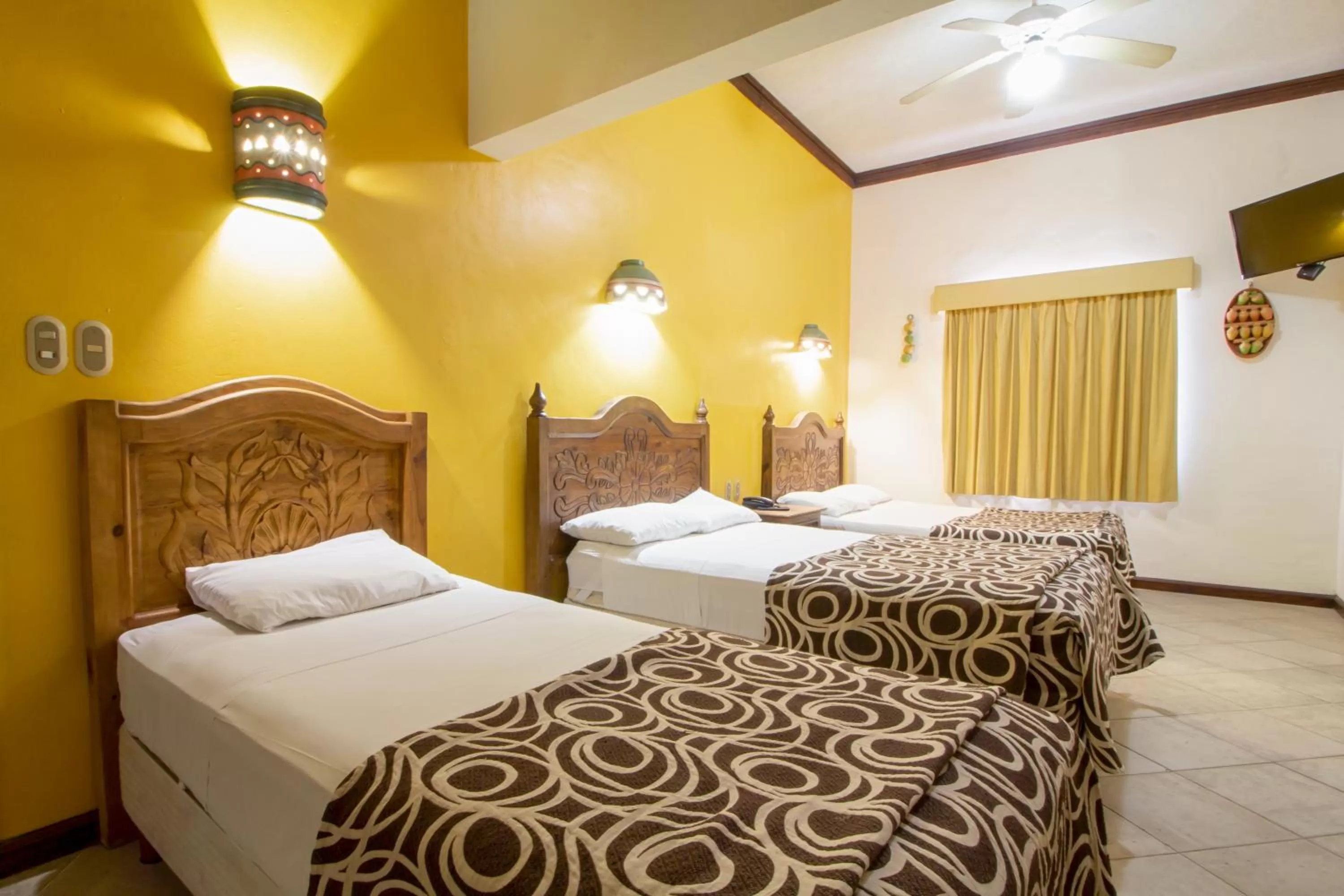 Triple Room in Suites Flamboyanes