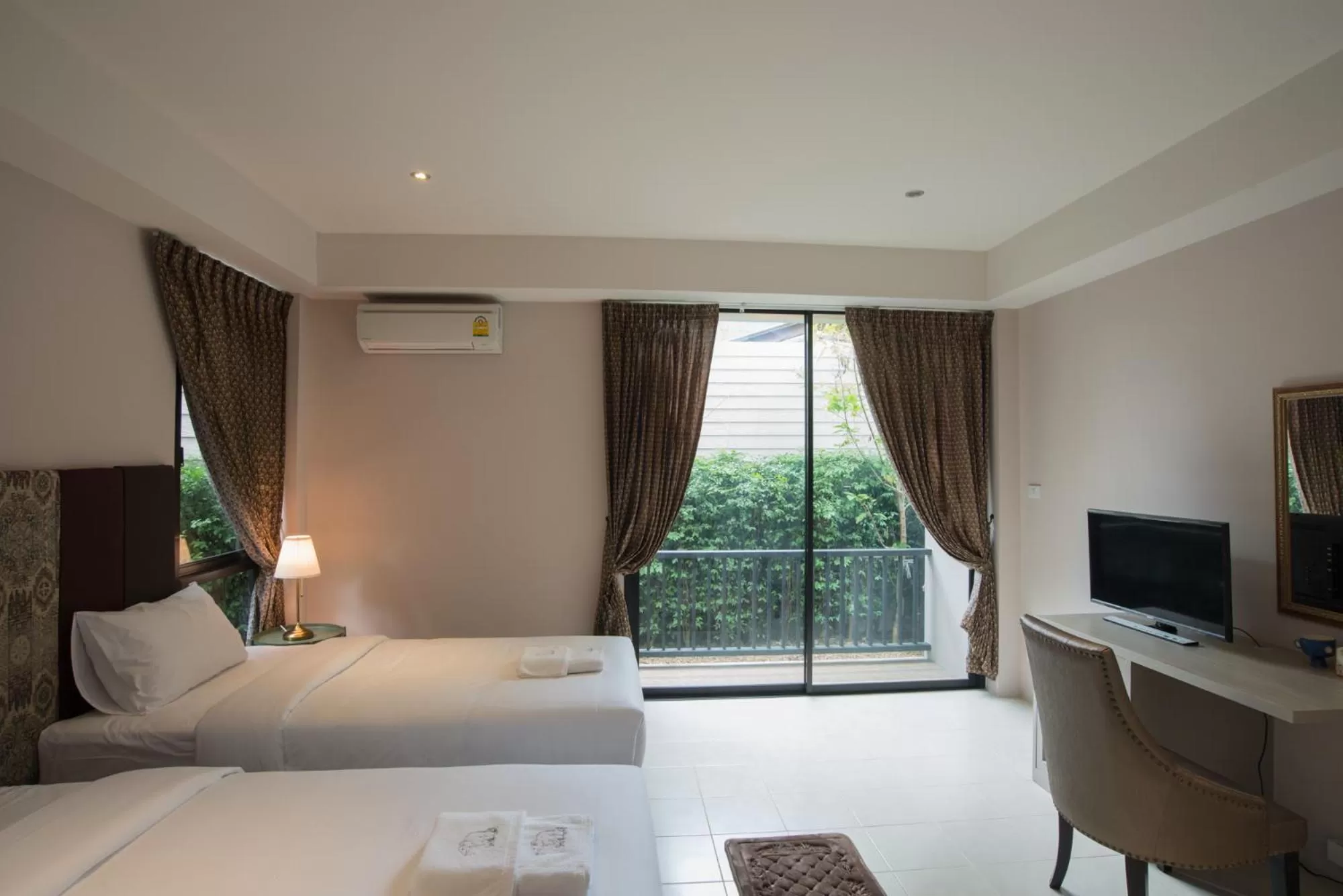 Triple Room with Garden View in Sri Ngachang