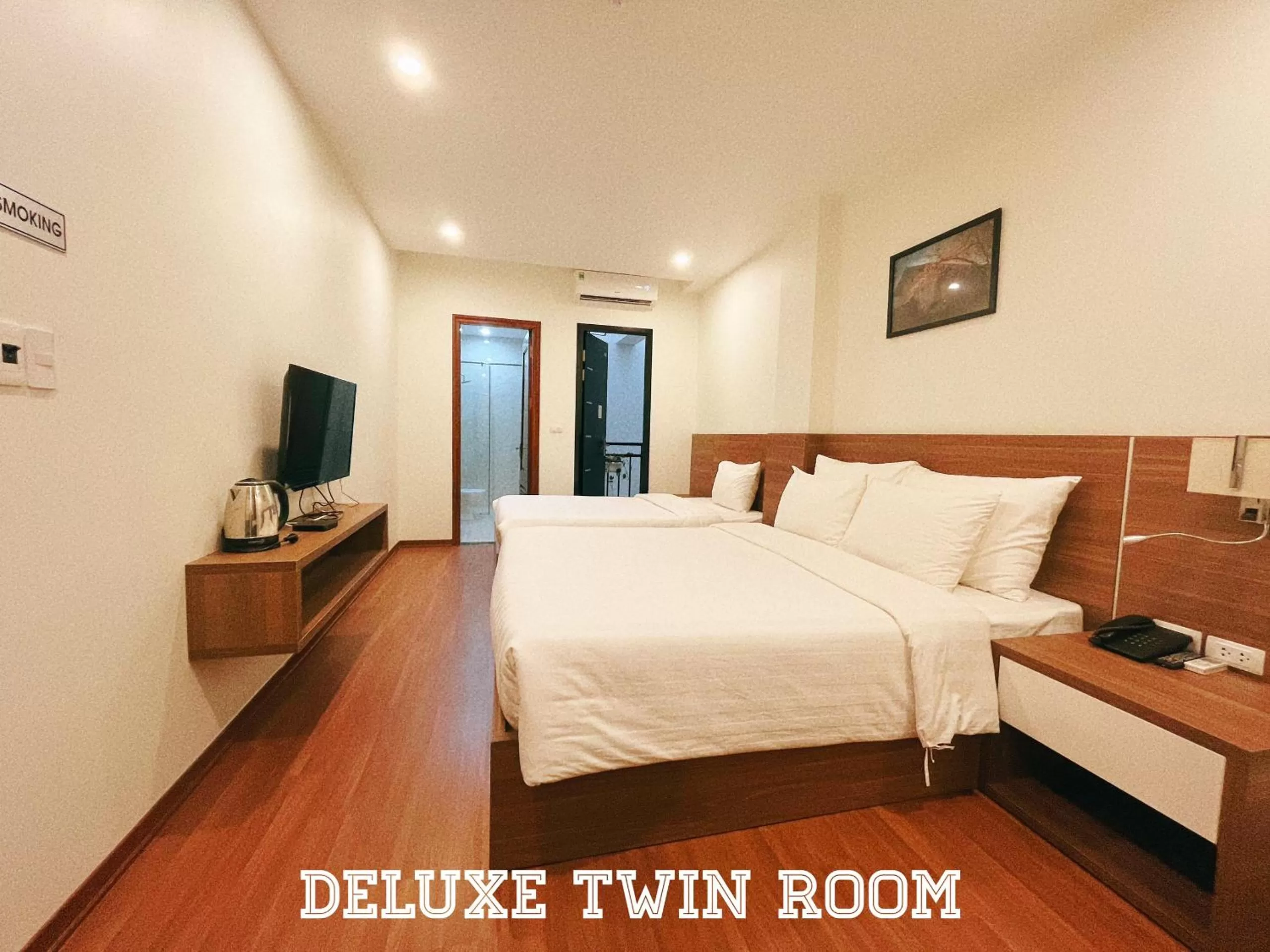 Deluxe Triple Room in Paragon House and Residence