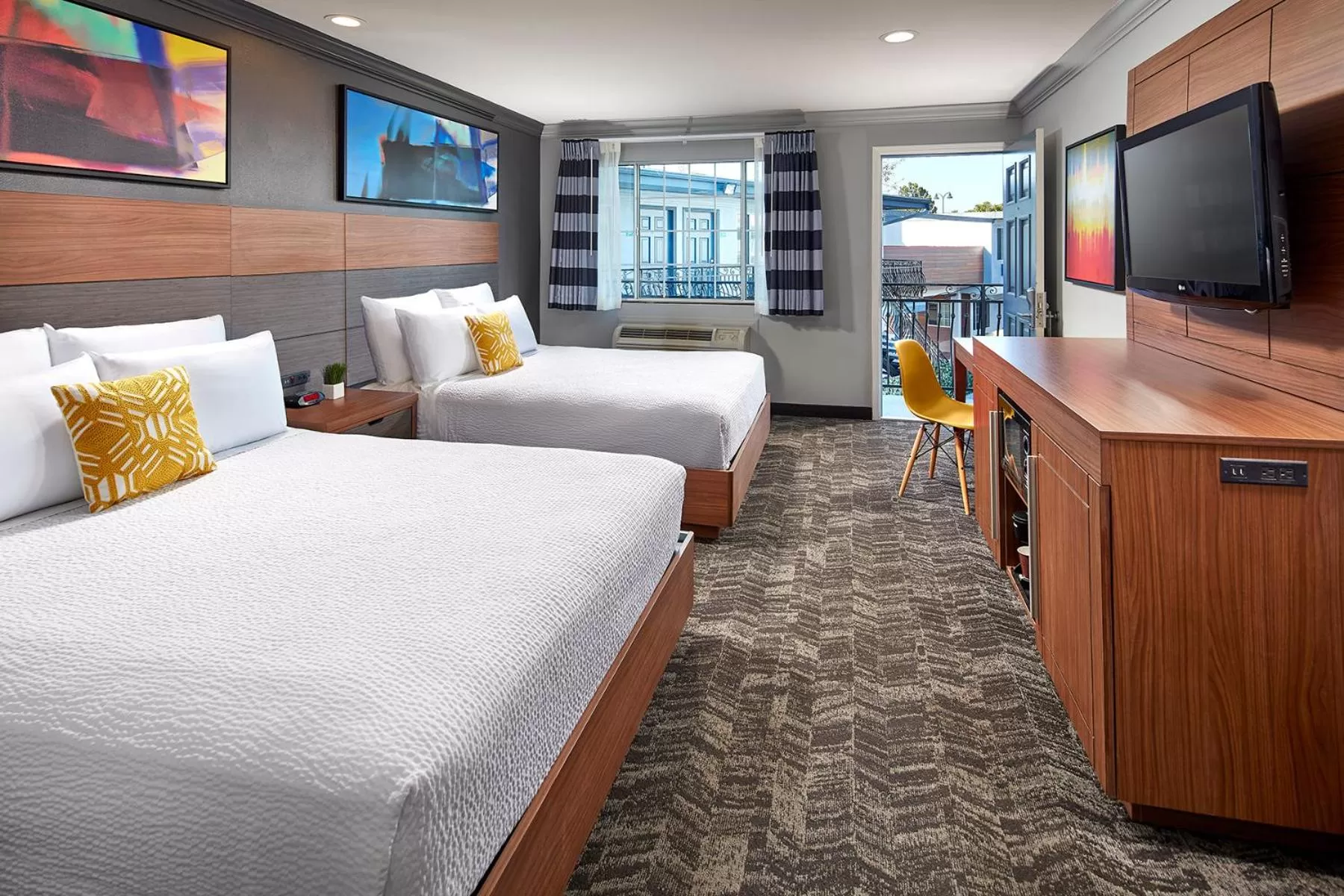 Queen Room with Two Queen Beds in Studio Inn & Suites at Promenade Downey