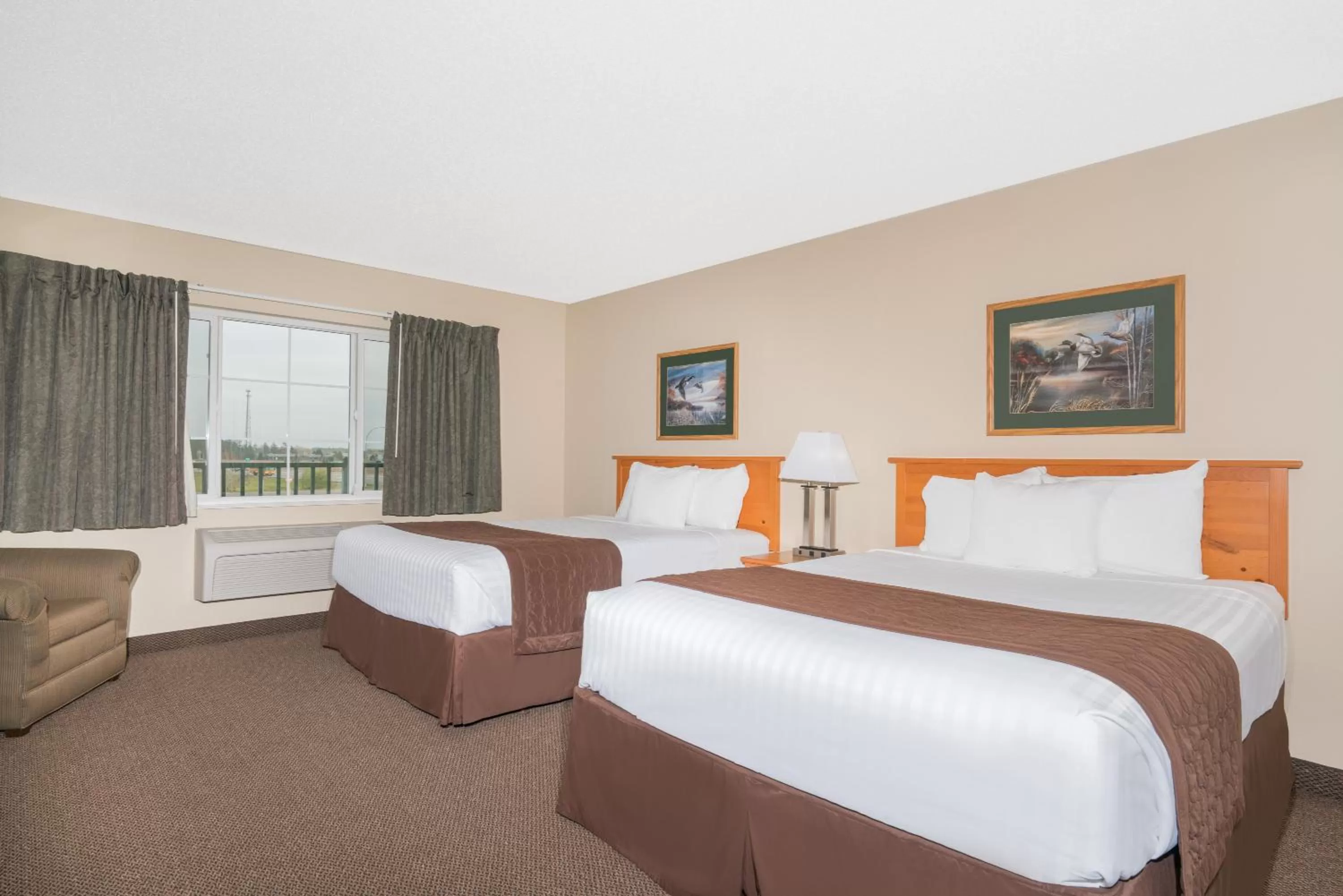 Deluxe Queen Suite with Two Queen Beds - Disability Access - Non-Smoking in Baymont by Wyndham Baxter/Brainerd Area
