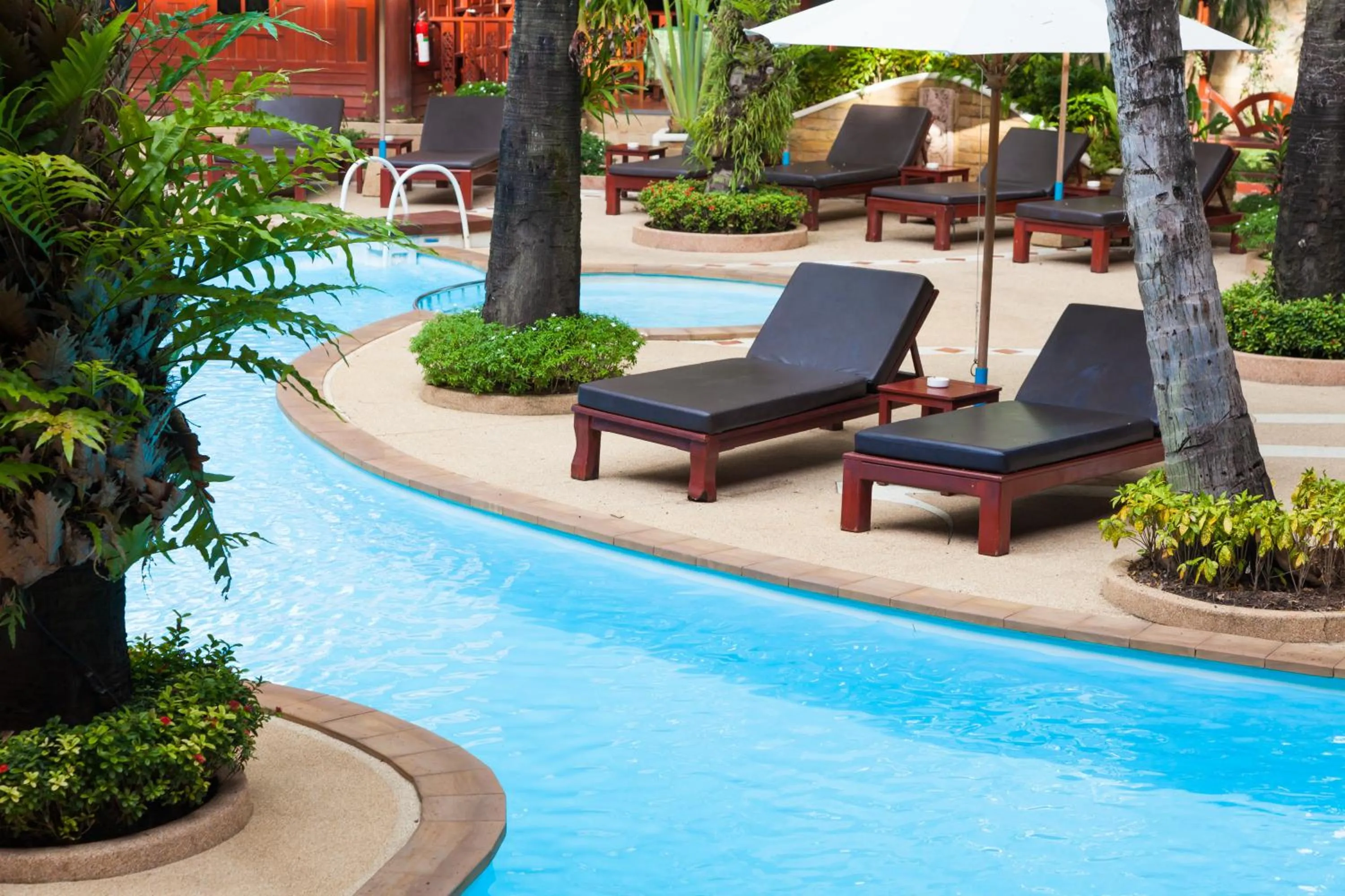 Deluxe Room with Balcony in Royal Phawadee Village Patong - 2 Minutes walk to the beach