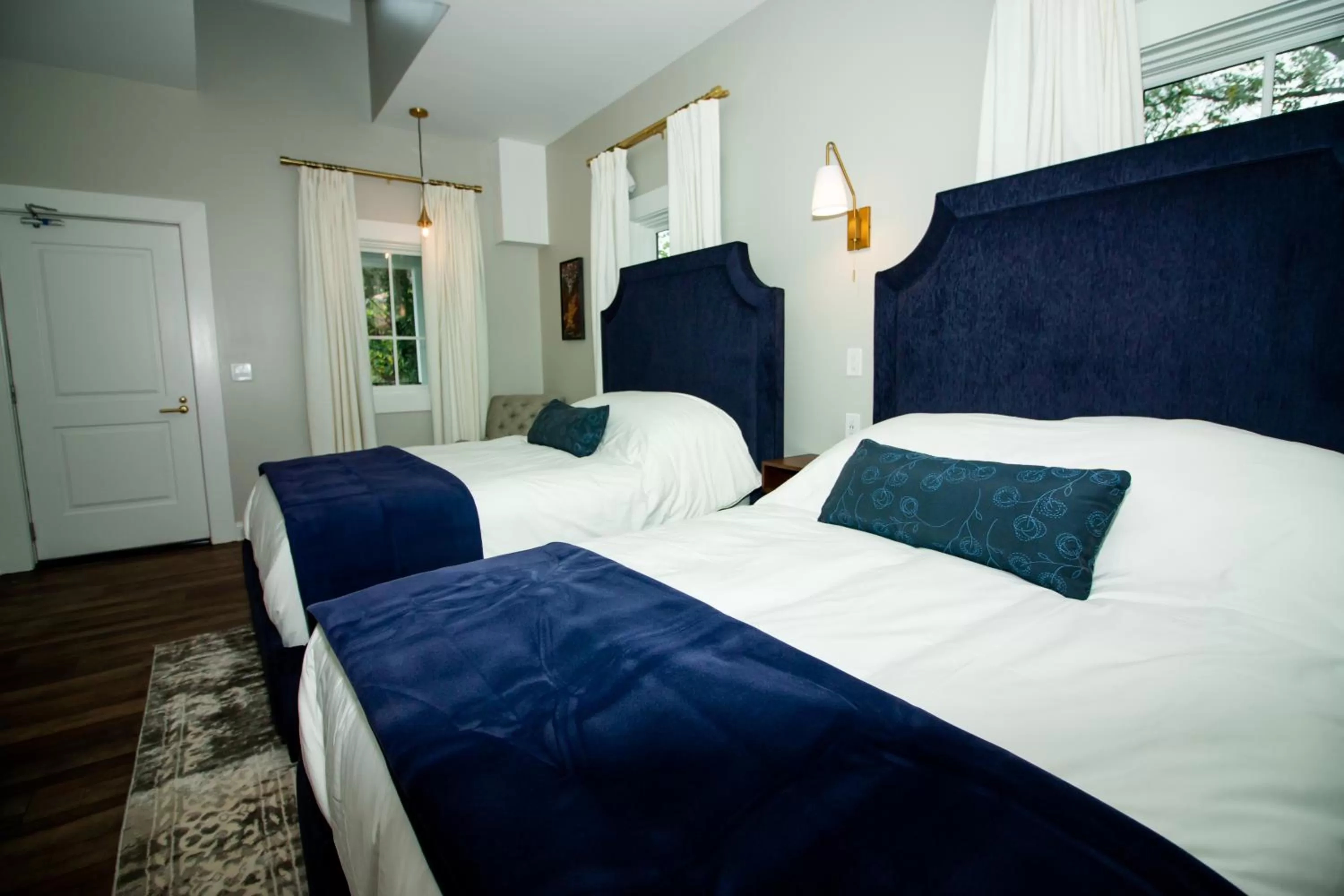 Standard Queen Room with Two Queen Beds in The Colonial Inn, an Ascend Collection Hotel