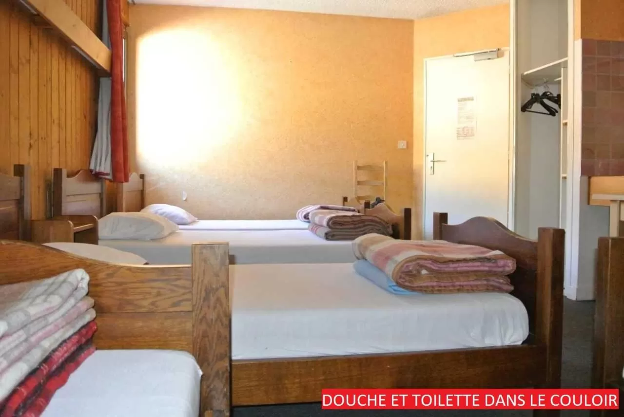 Photo of the whole room, Bed in Espace Morteau