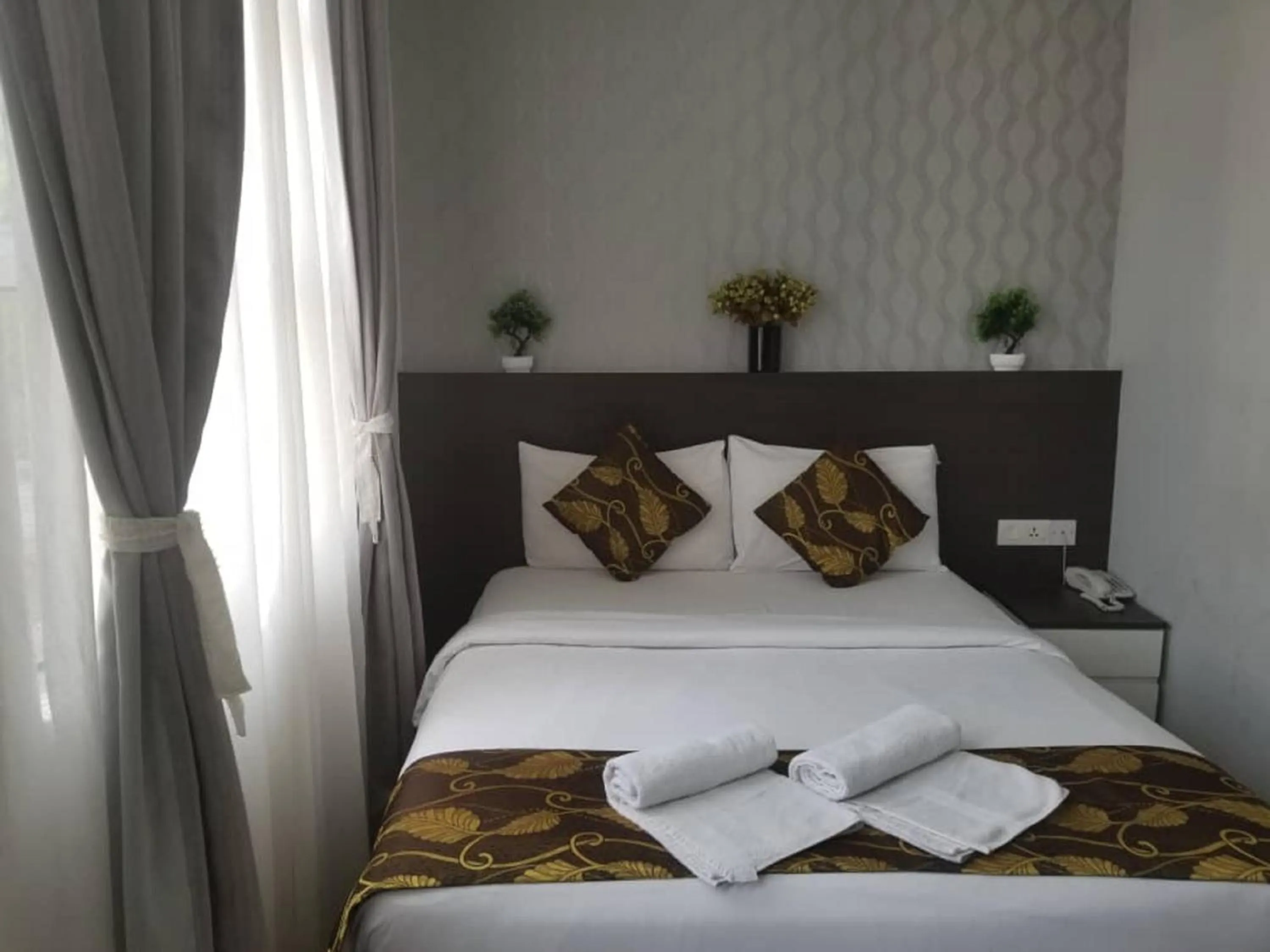 Deluxe Queen Room with Window in D'Metro Hotel