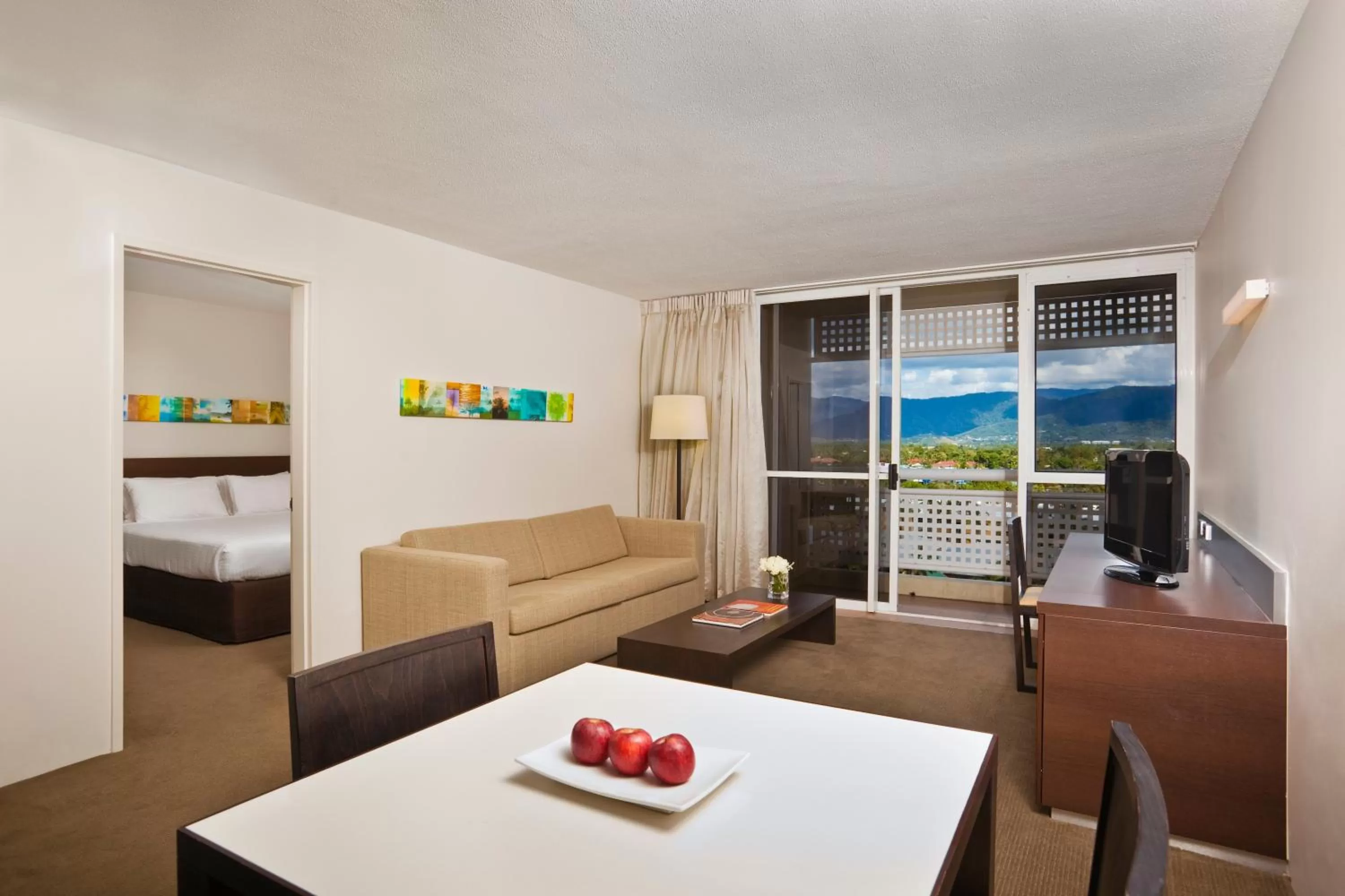 One-Bedroom King Suite with Sofa Bed in Cairns Harbourside Hotel