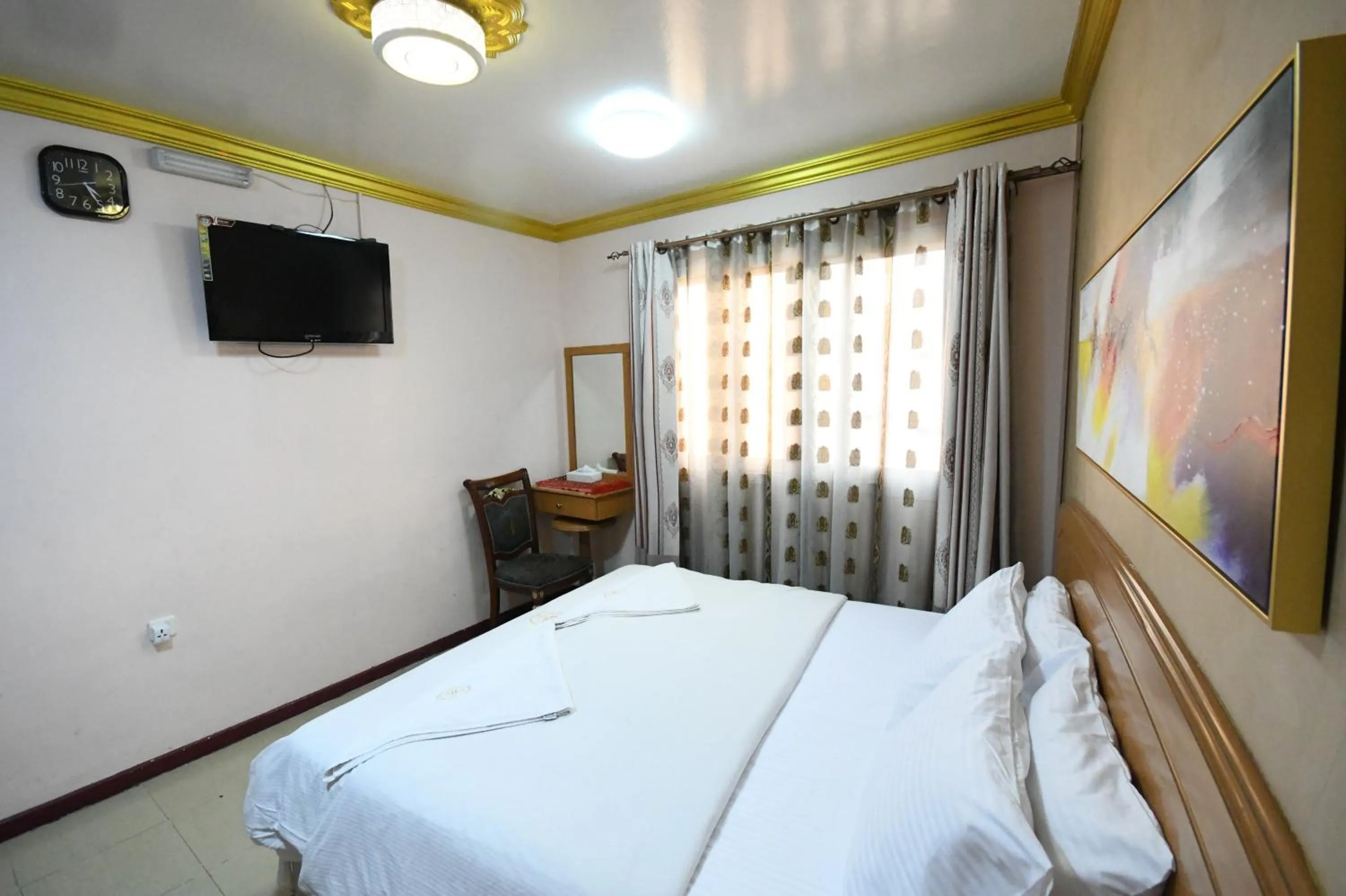 Bed in Maaeen Hotel