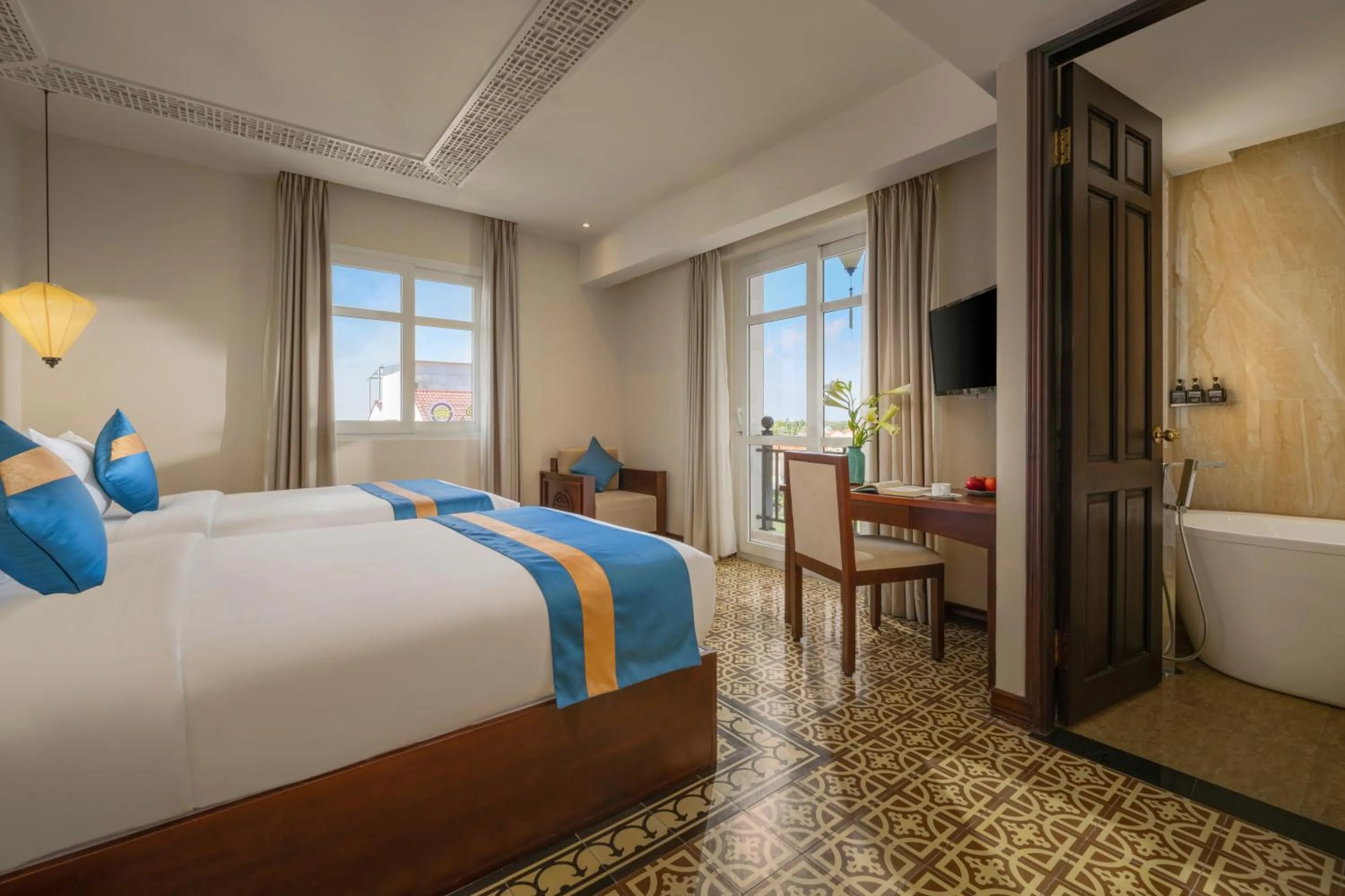 Twin Room with Pool View in Royal Riverside Hoi An Hotel & Spa