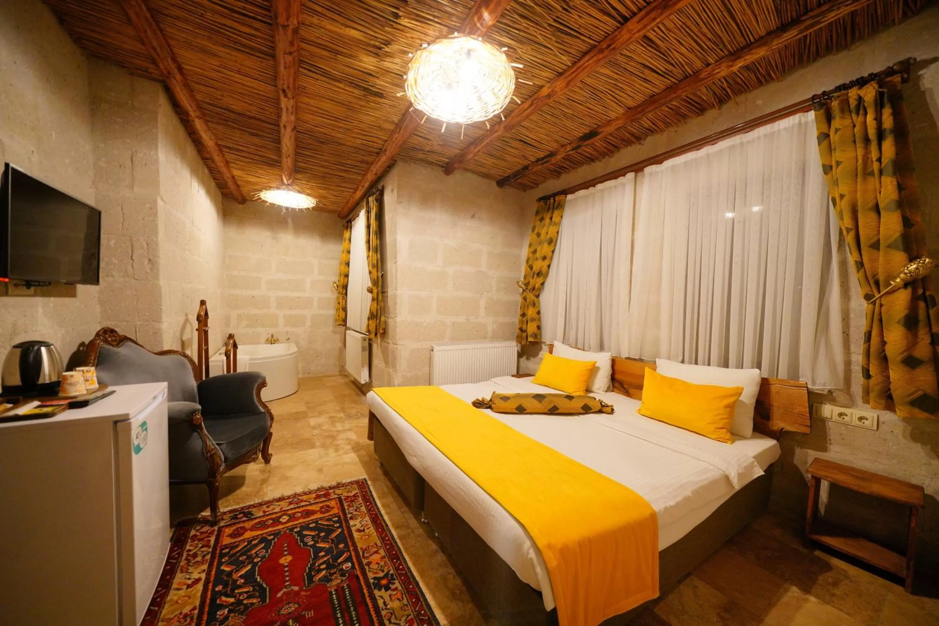Stone Double Room  Bathtub with Valley View in Cappadocia Nar Cave House & Swimming Pool
