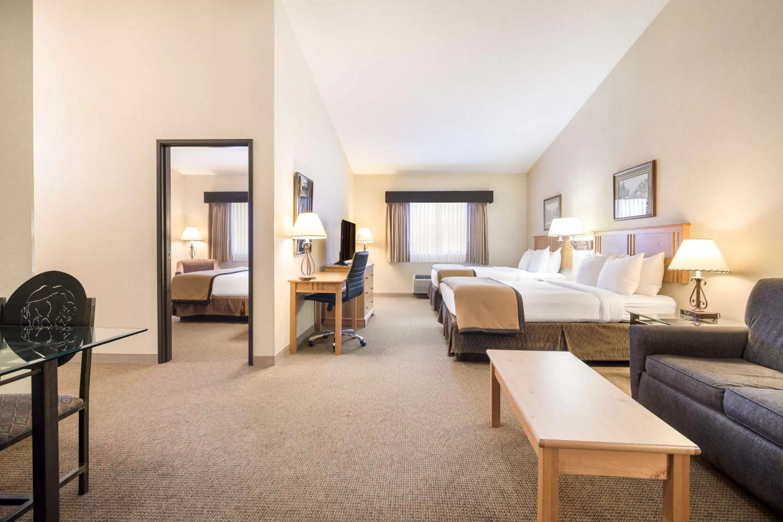 Family Suite with One King Bed and Two Queen Beds in Best Western Golden Spike Inn & Suites