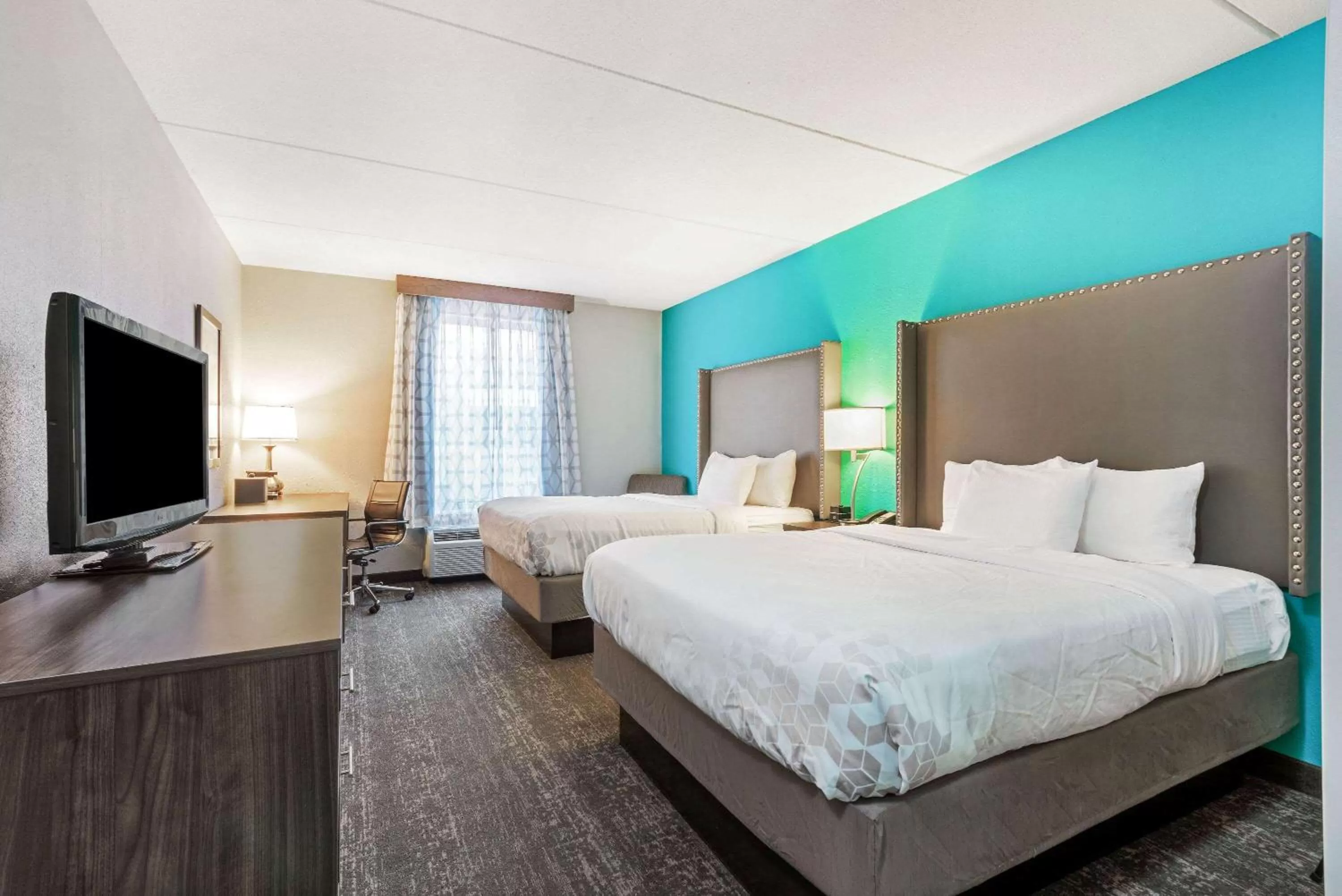 Executive Queen Room with Two Queen Beds and Sofa Bed in La Quinta by Wyndham Jamestown