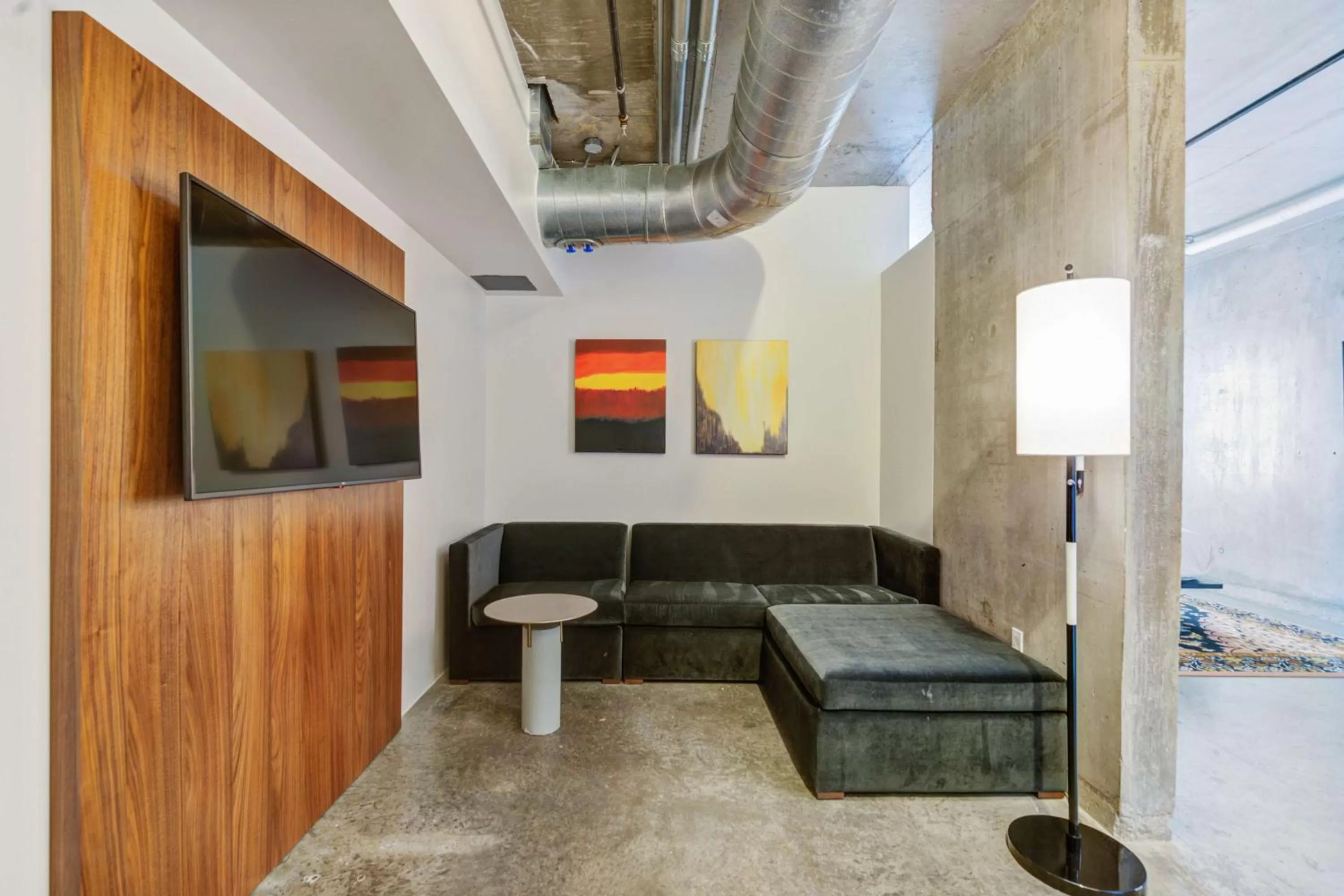 Junior King Suite with Seating Area in NYLO Dallas Plano Hotel, Tapestry Collection by Hilton