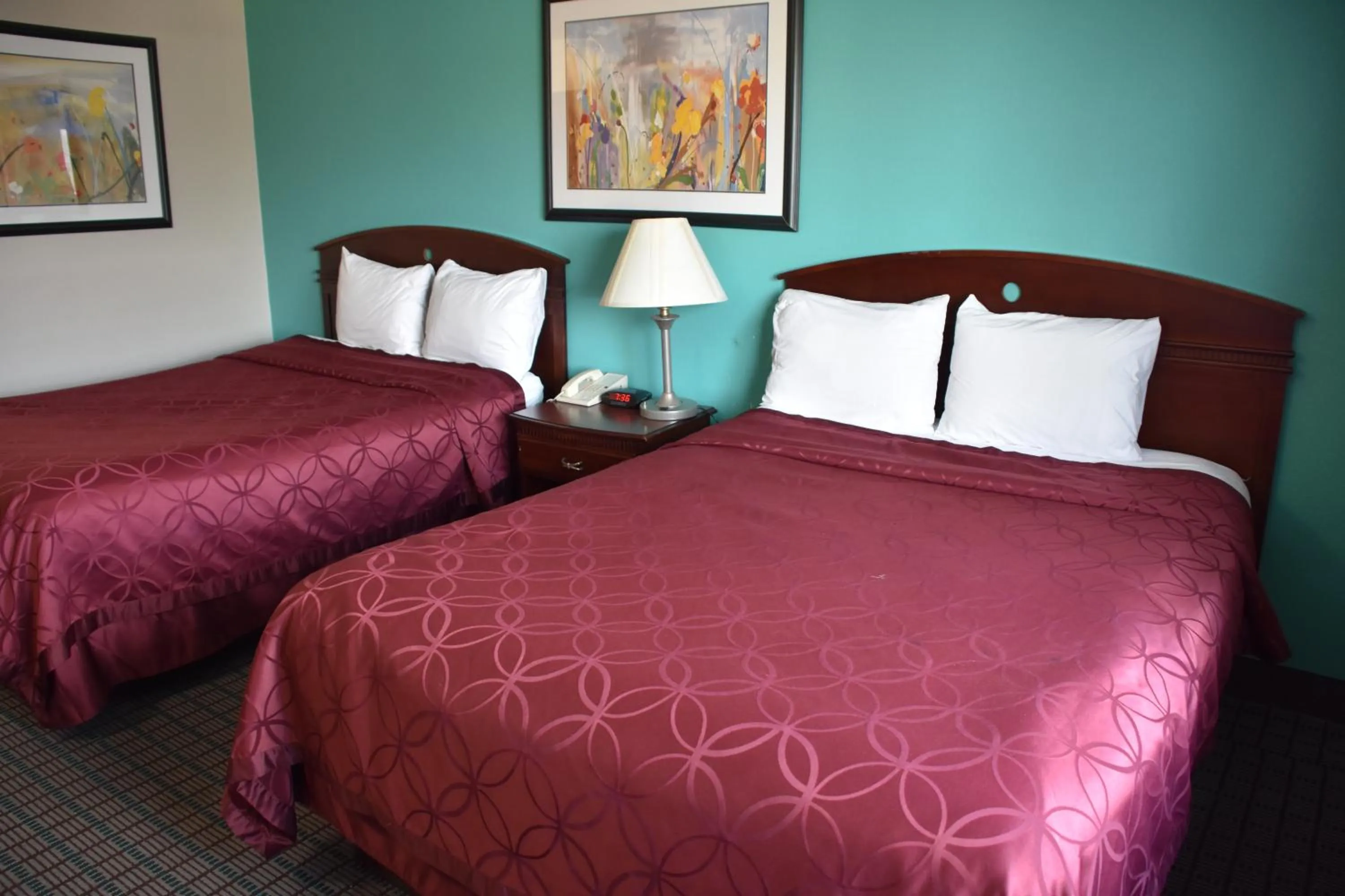 Queen Room with Two Queen Beds - Non-Smoking in Rodeway Inn