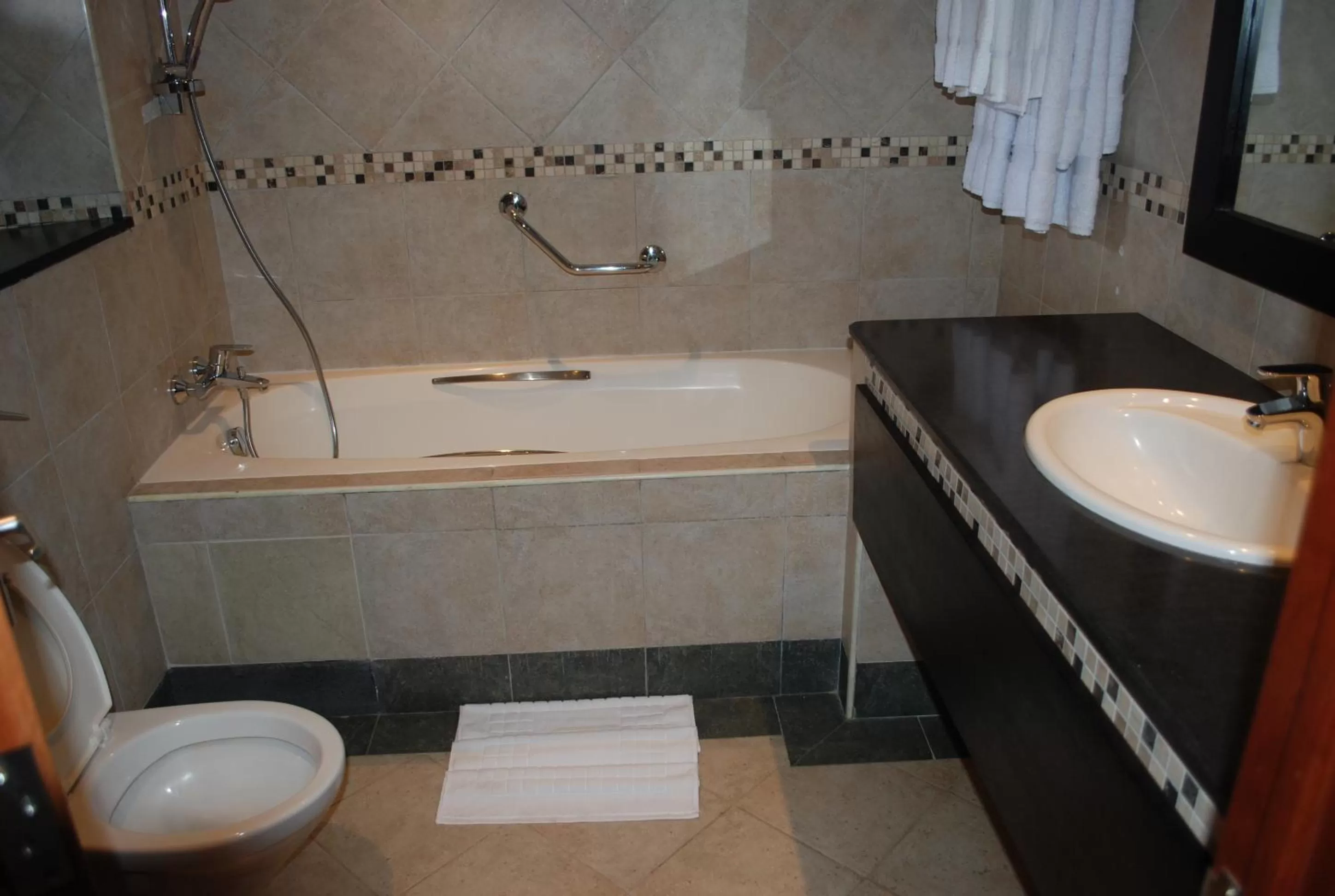 Shower in Sunset Reef Resort & Spa