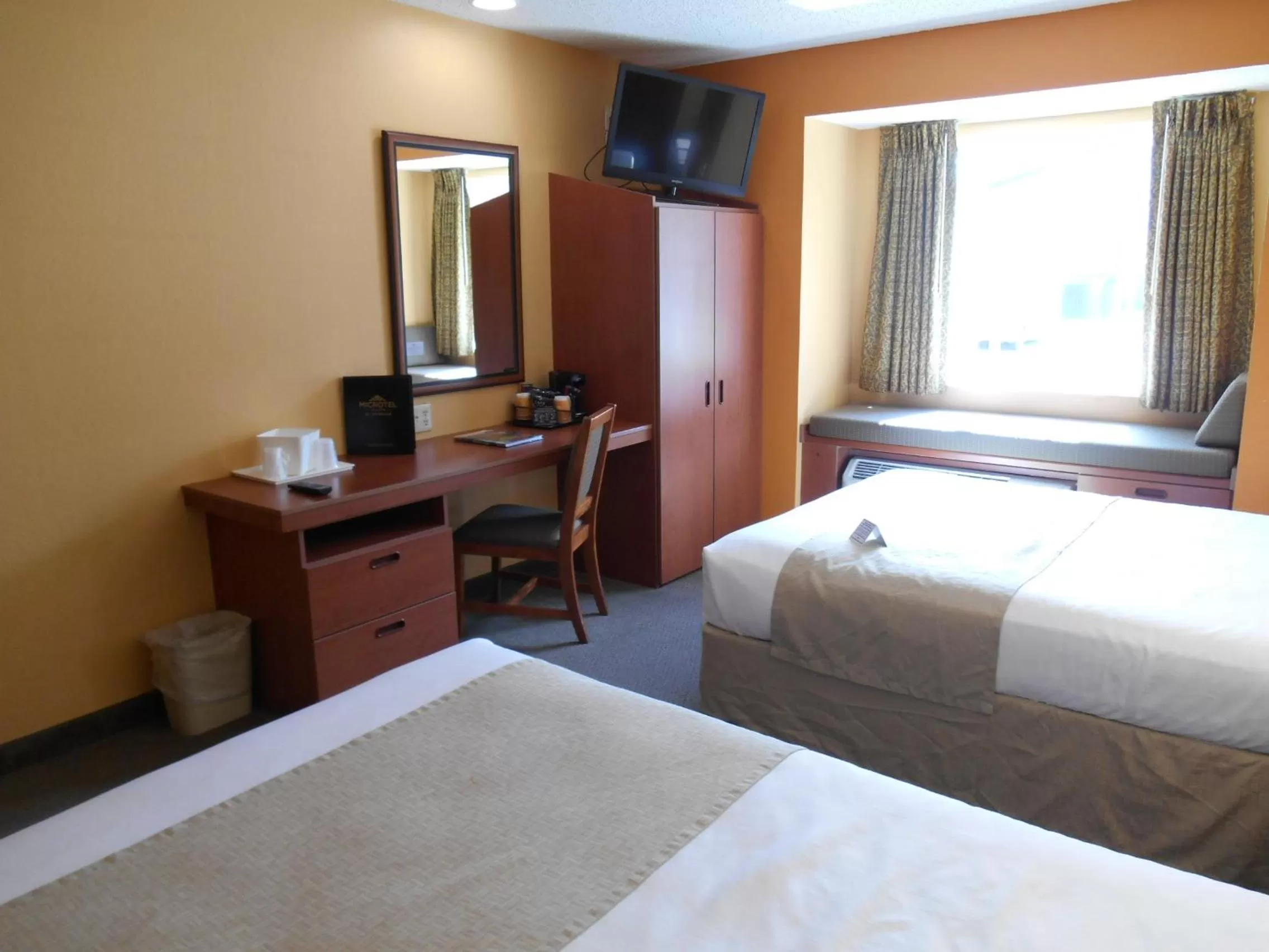 Queen Room with Two Queen Beds - Non-Smoking in Microtel Inn & Suites by Wyndham Cherokee