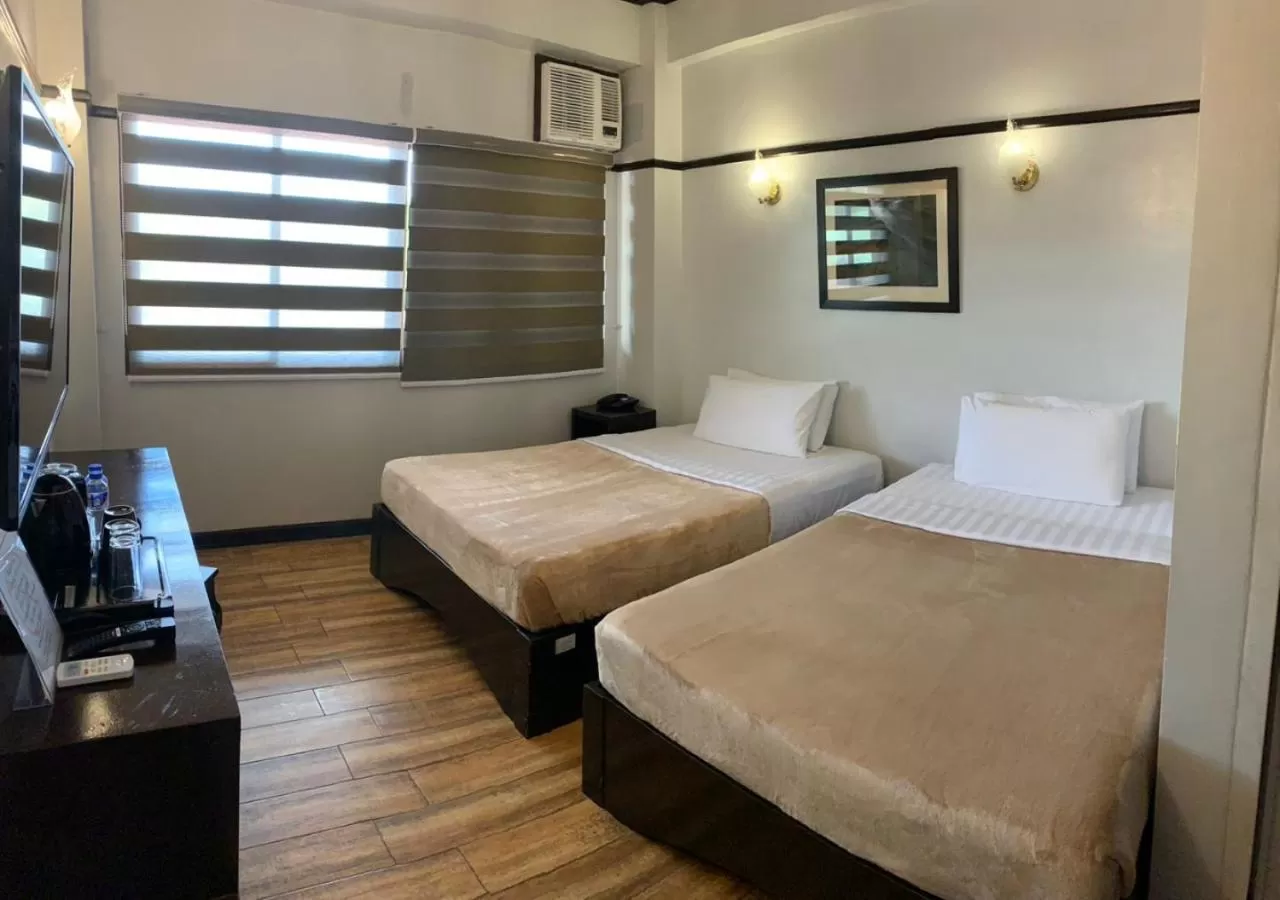 SUPERIOR ROOM WITH AIRCON in Venus Parkview Hotel