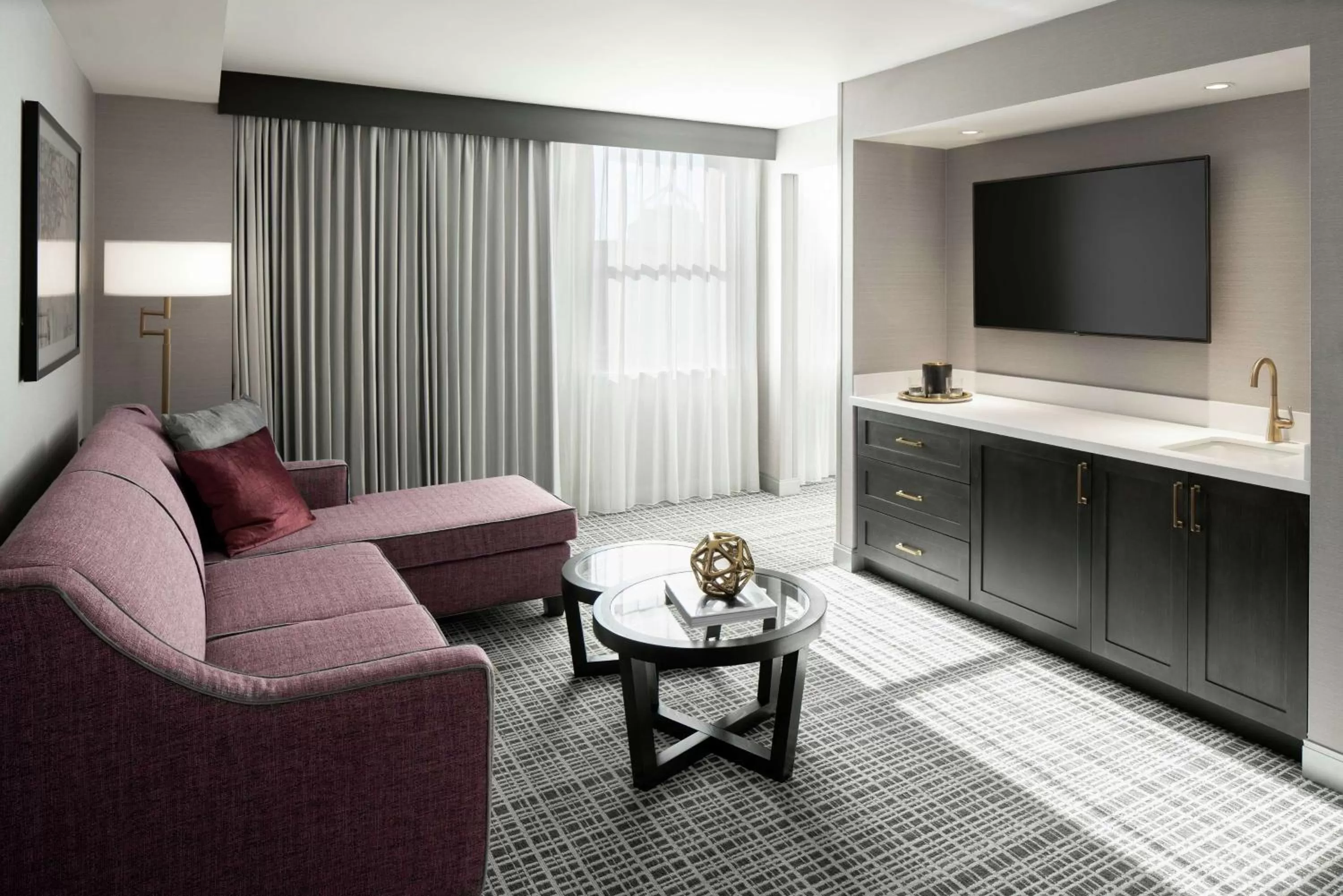 One-Bedroom King Suite - Hearing Access in The Axis Moline Hotel, Tapestry Collection By Hilton