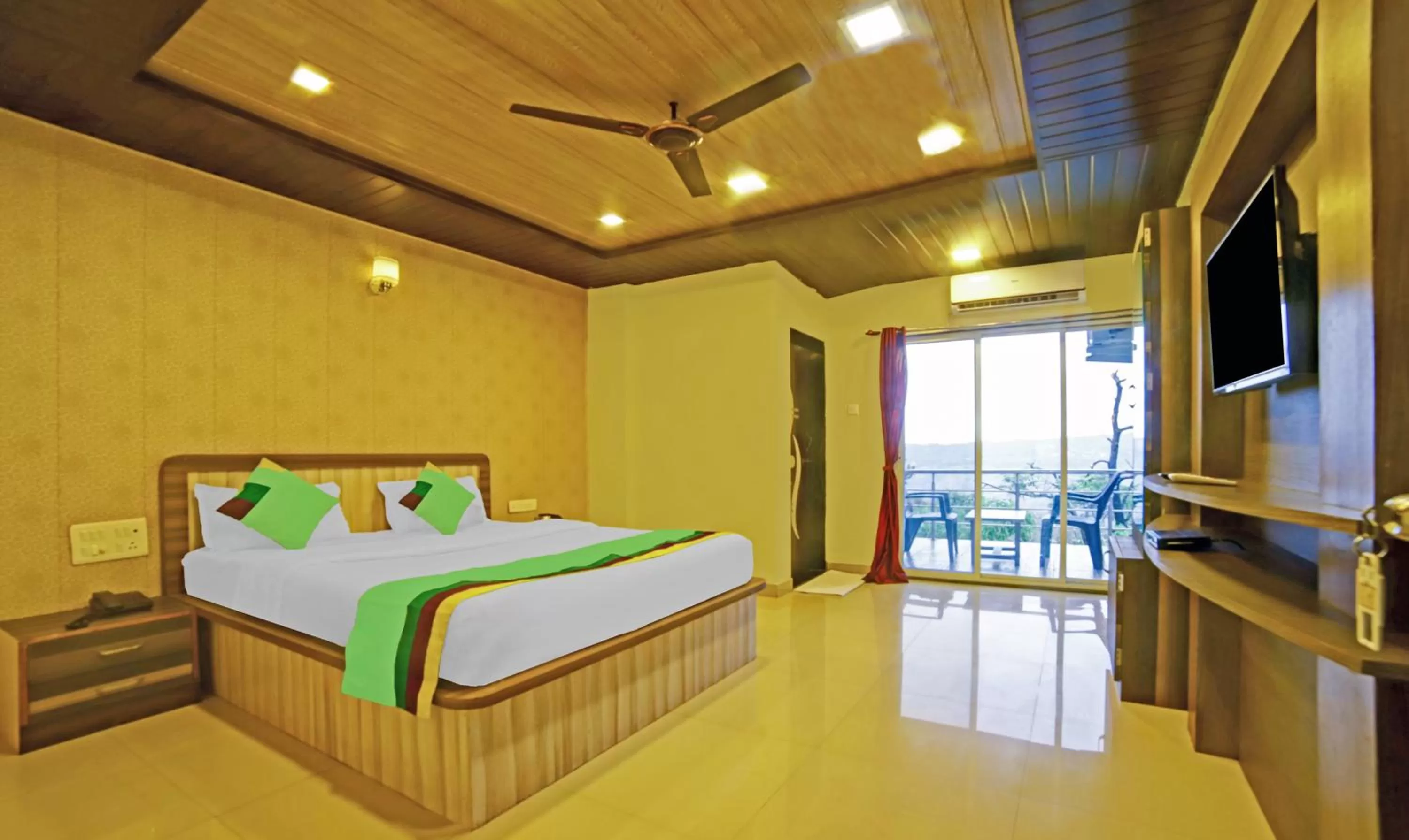 Deluxe Room with Balcony in Treebo Balaji Excellency with Pool & Spa