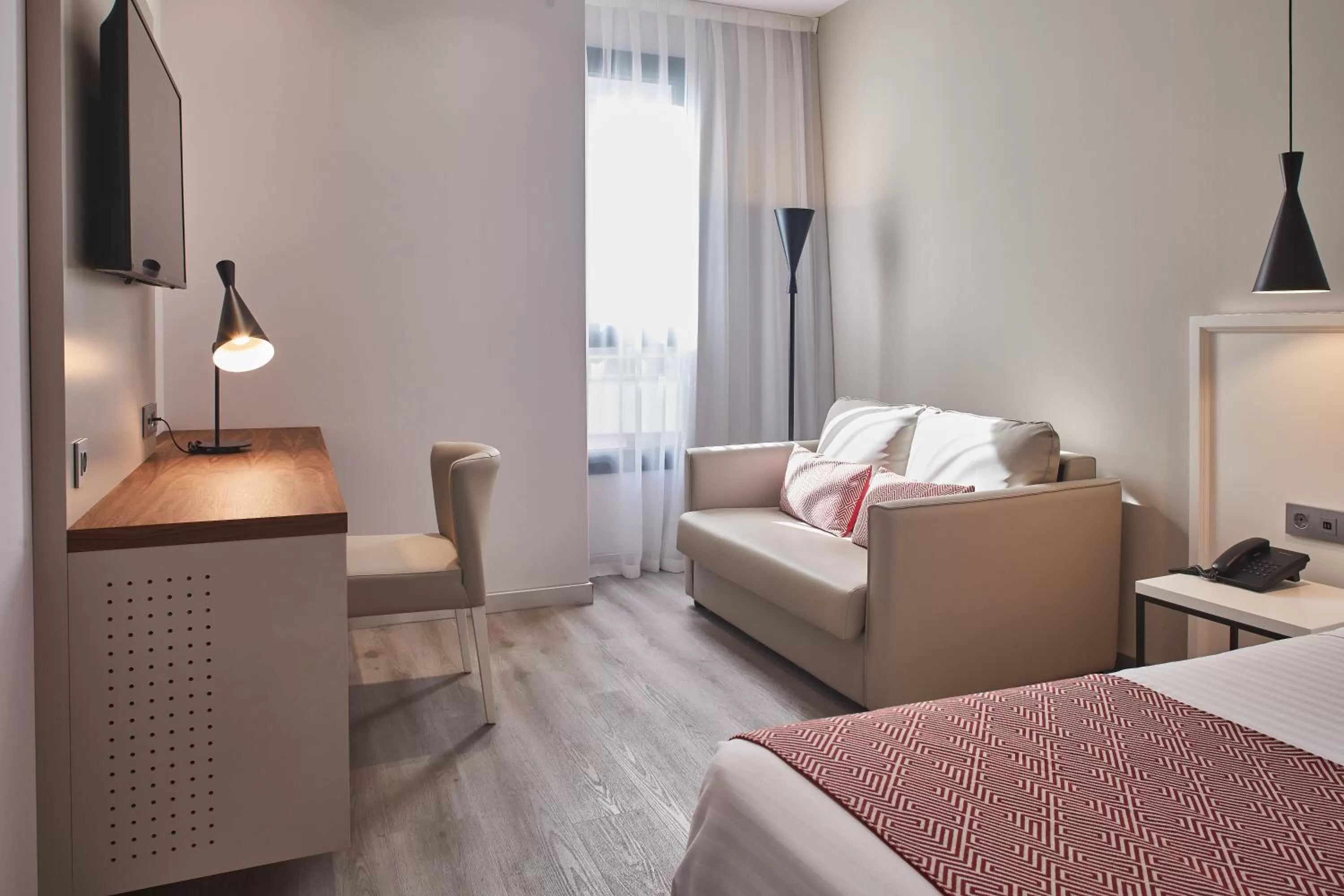 Deluxe Double Room (2 Adults + 1 Child) in Silken Rona Dalba