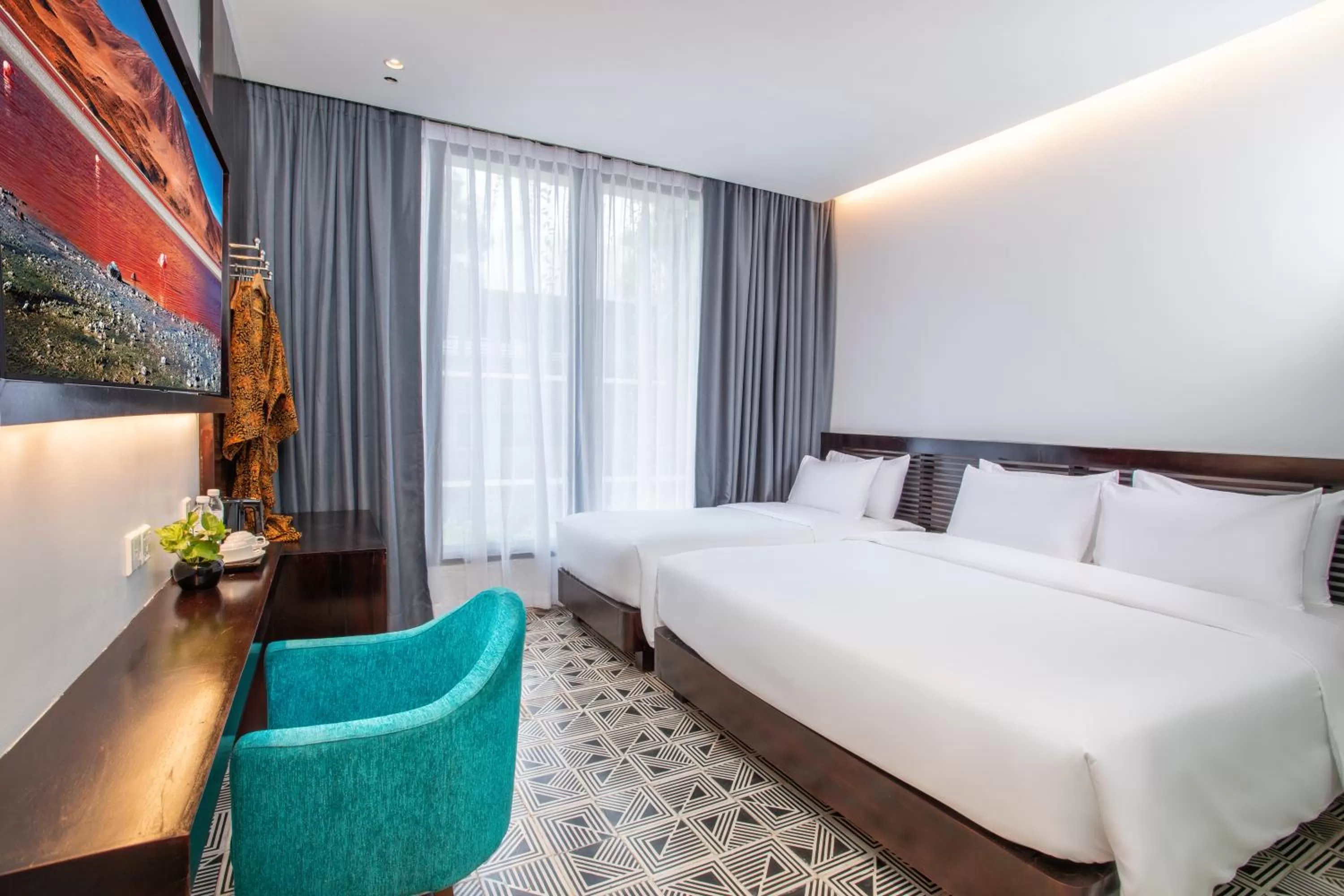 Deluxe Triple Room in UTEY Hotel