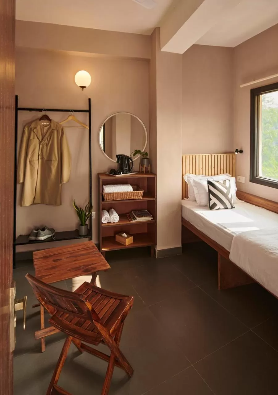 Single Room with Balcony in Minimalist Poshtel & Suites