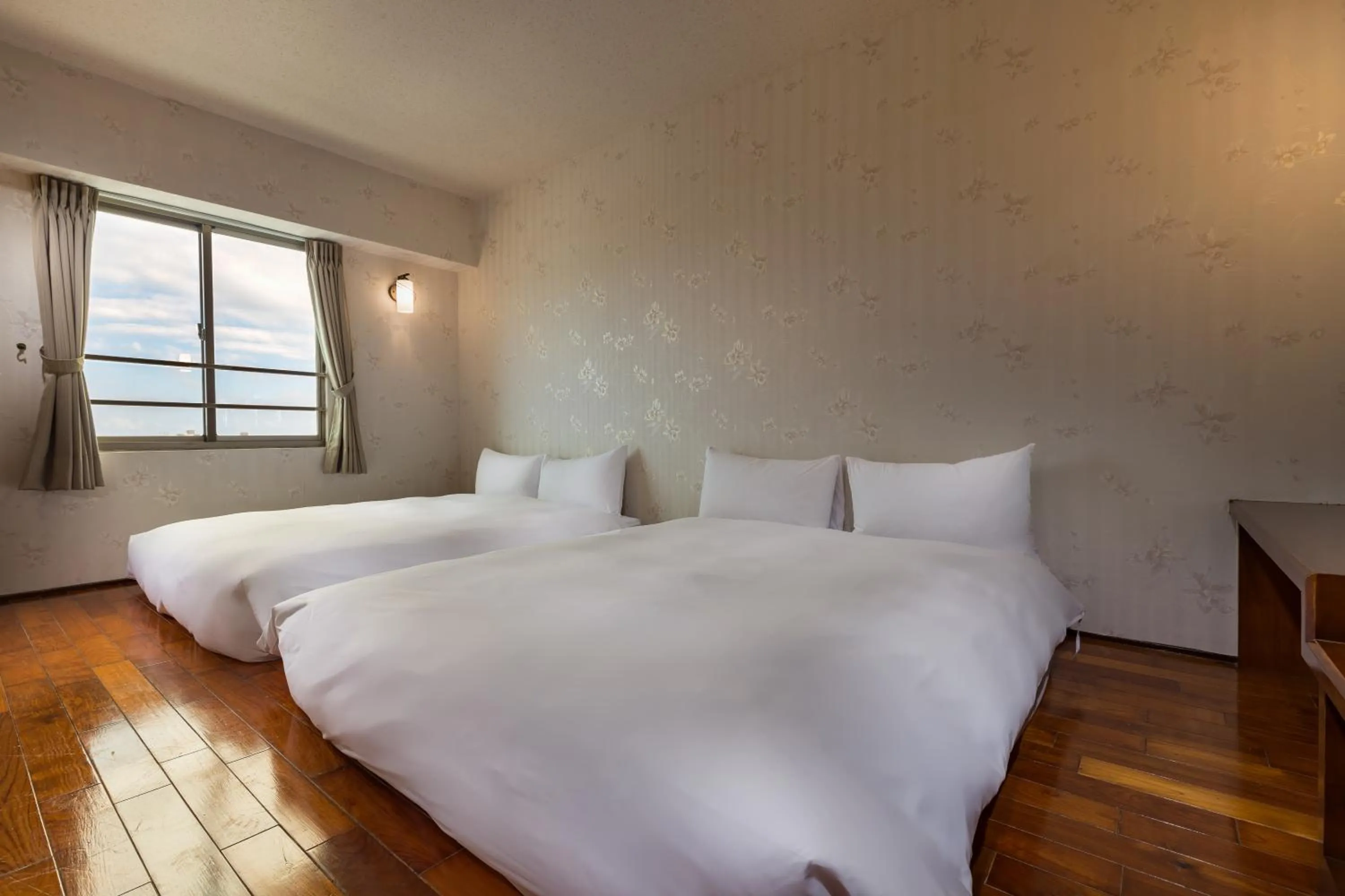 Japanese Quadruple Room in Lishin Hotel