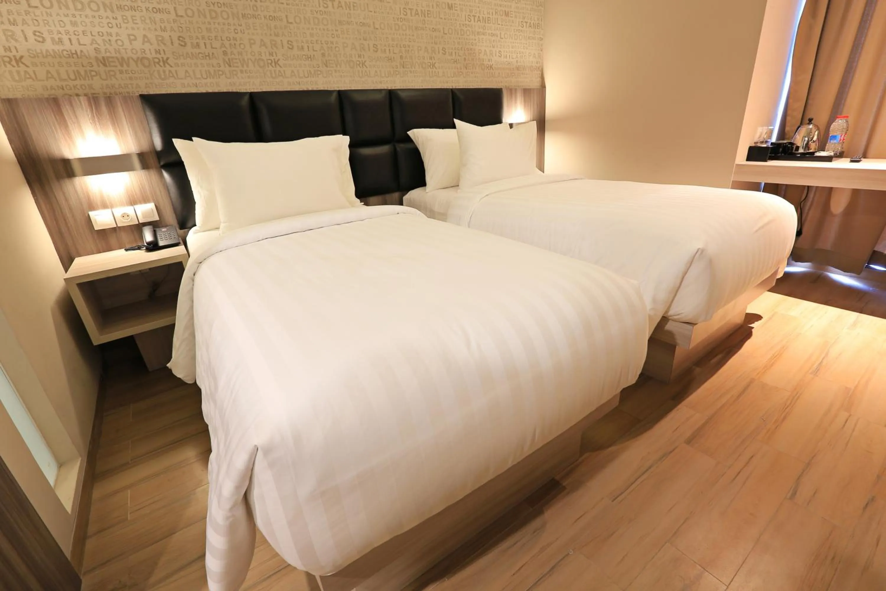 Deluxe Twin Room in Luminor Hotel Jambi Kebun Jeruk By WH