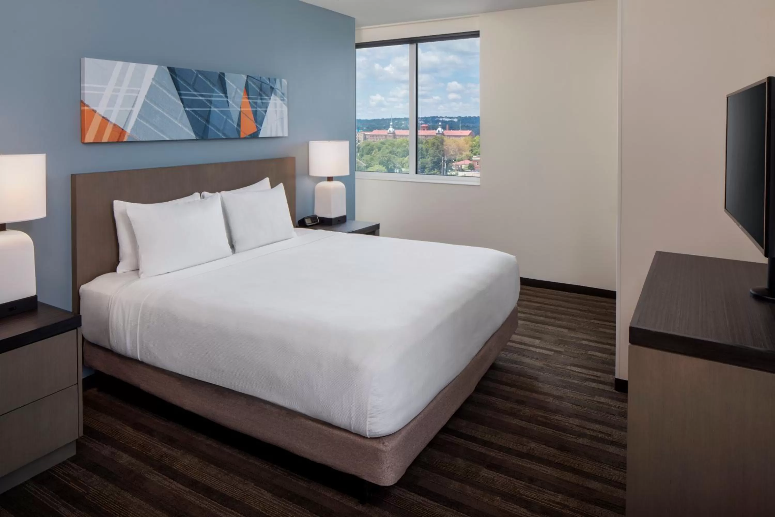 Two-Bedroom Suite One King Bed, Two Queen Beds, Sofa Bed and Kitchen in Hyatt House Augusta Downtown