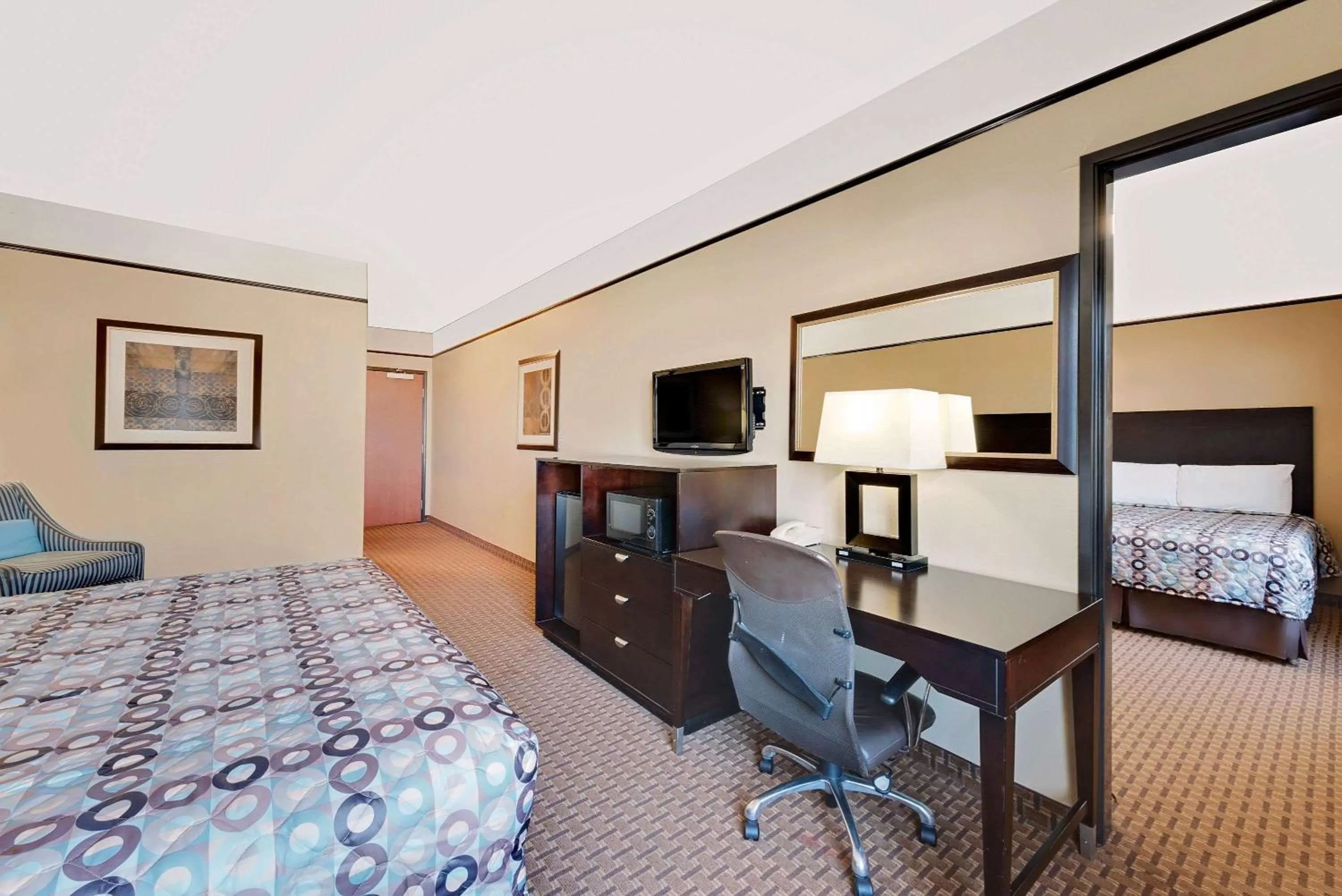 One-Bedroom Suite with One King Bed and One Queen Bed - Smoking in Super 8 by Wyndham Odessa TX