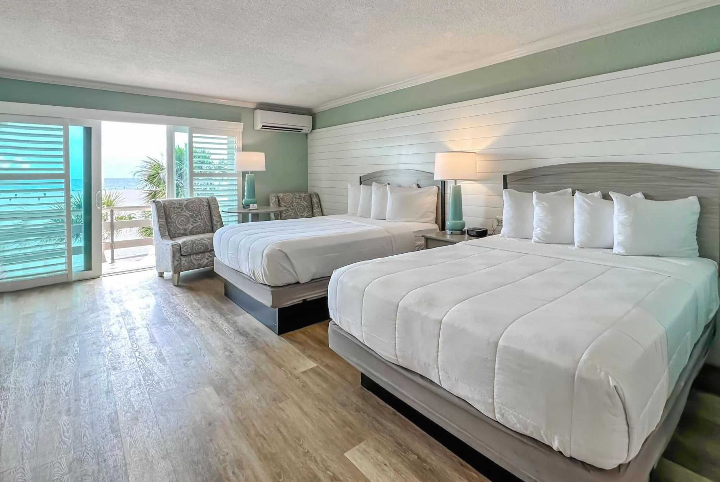 Standard Room With Two Queen Beds and Kitchenette - Gulf Front in Thunderbird Beach Resort