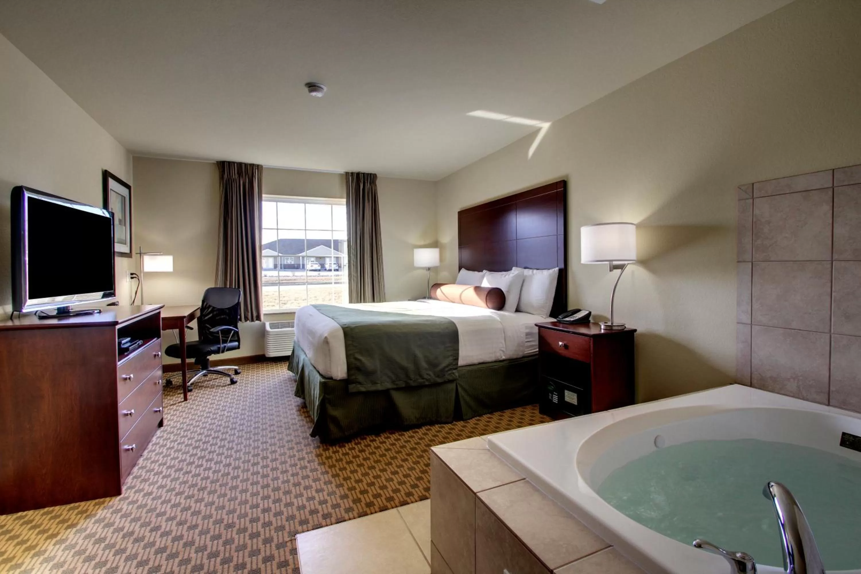 King Room with Spa Bath in Cobblestone Inn & Suites - Rugby