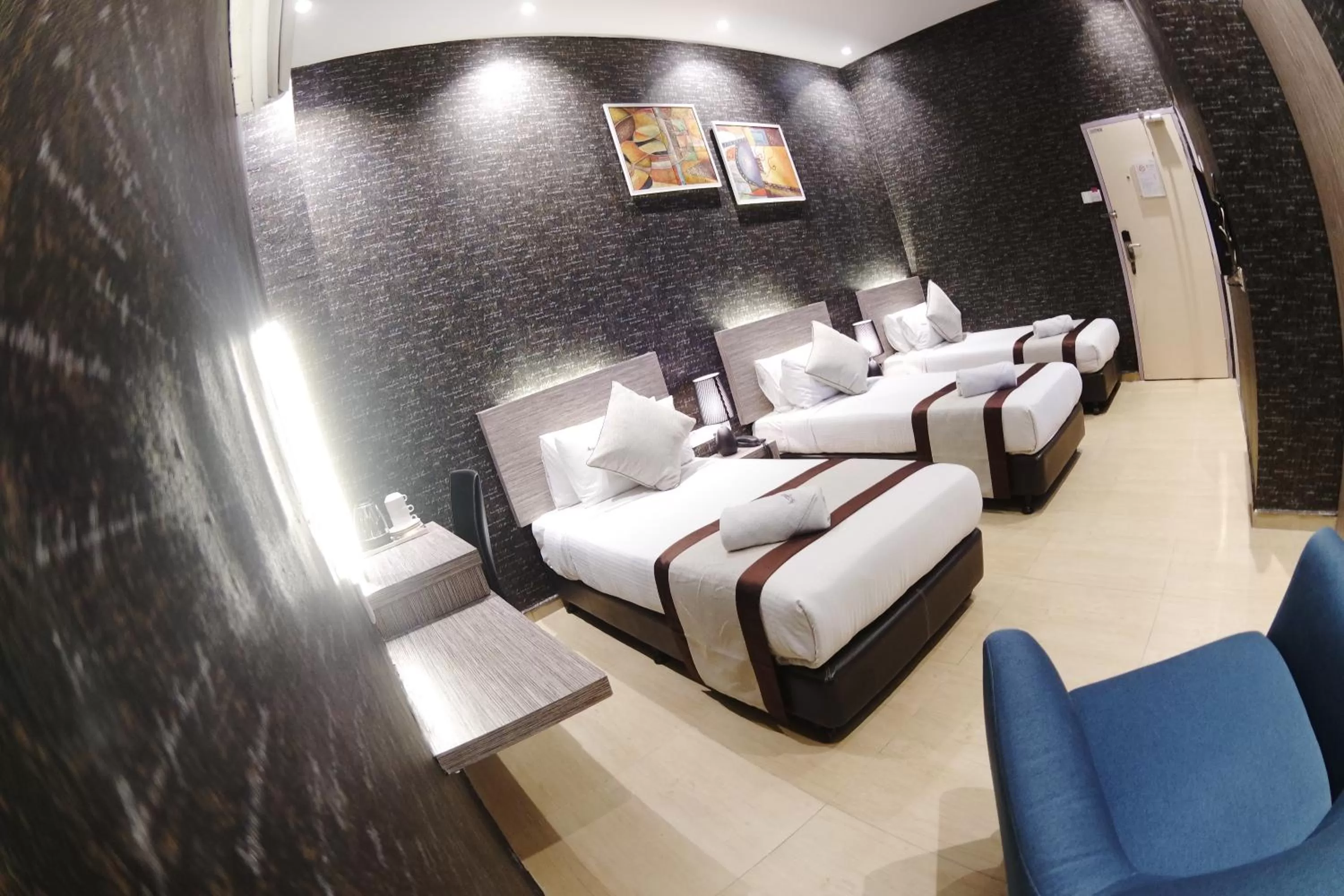 Deluxe Triple Room in Here Hotel