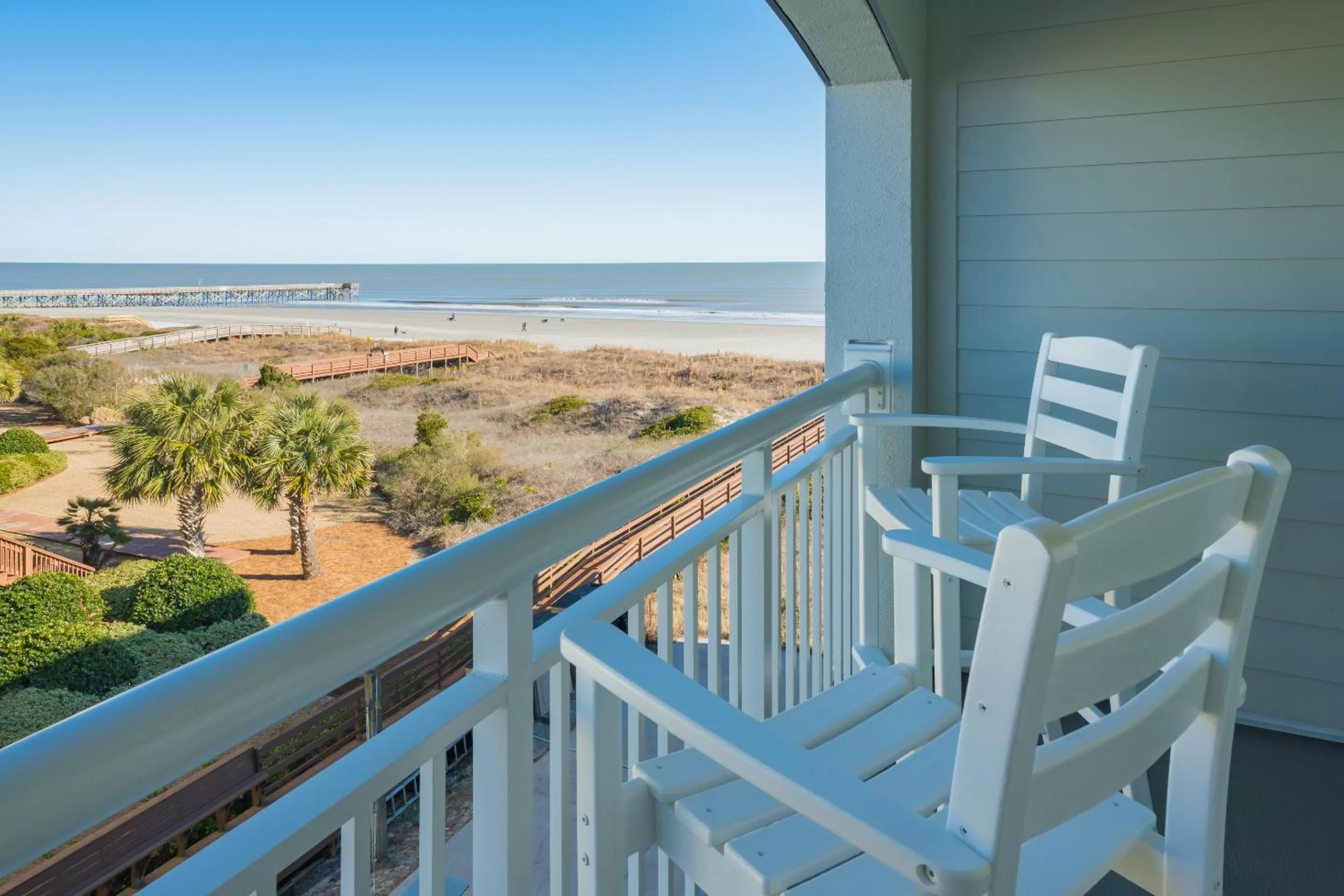 Standard King Room with Balcony - Partial Ocean View in The Palms Oceanfront Hotel