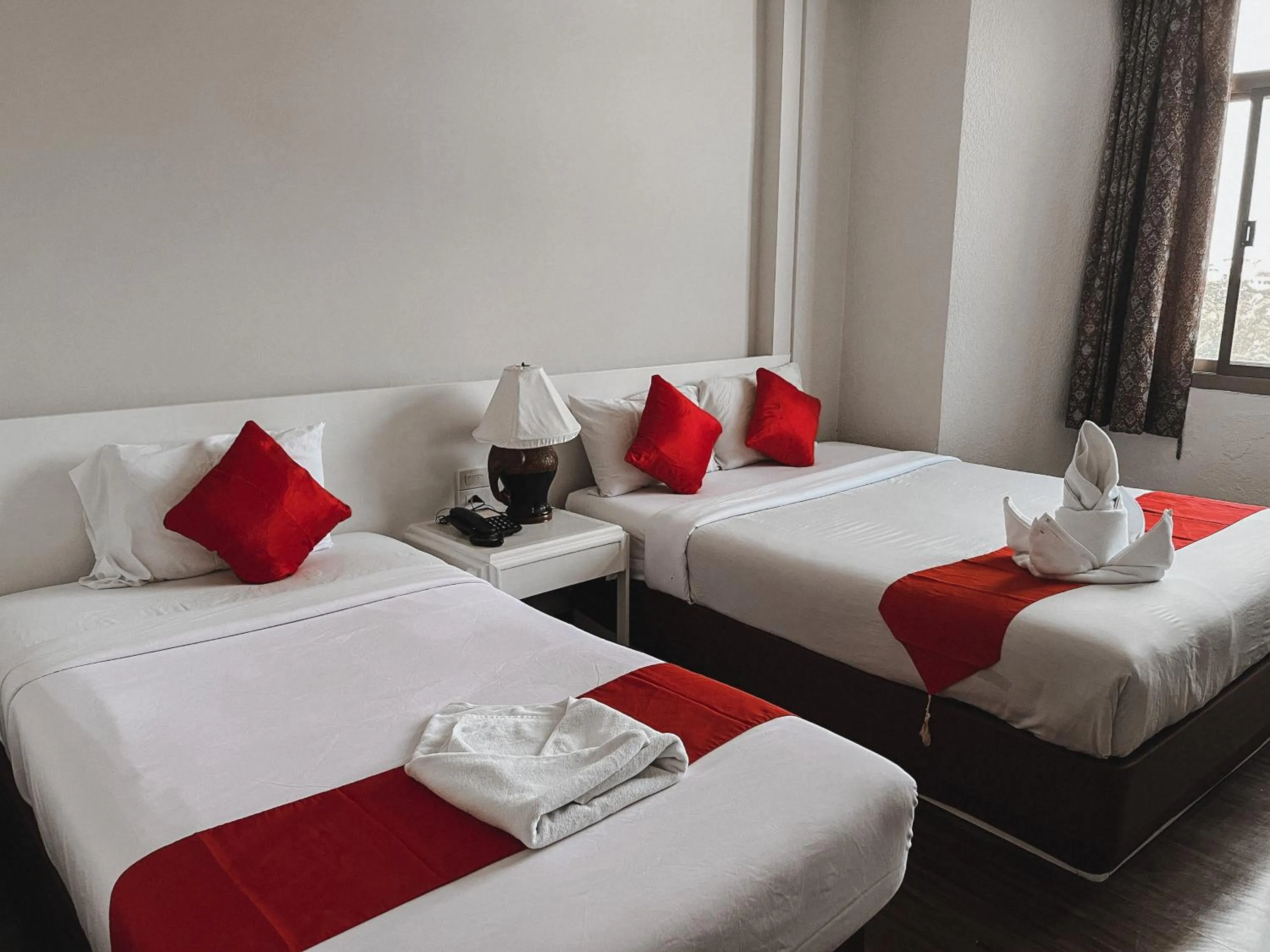 Deluxe Triple Room in River Grand Hotel