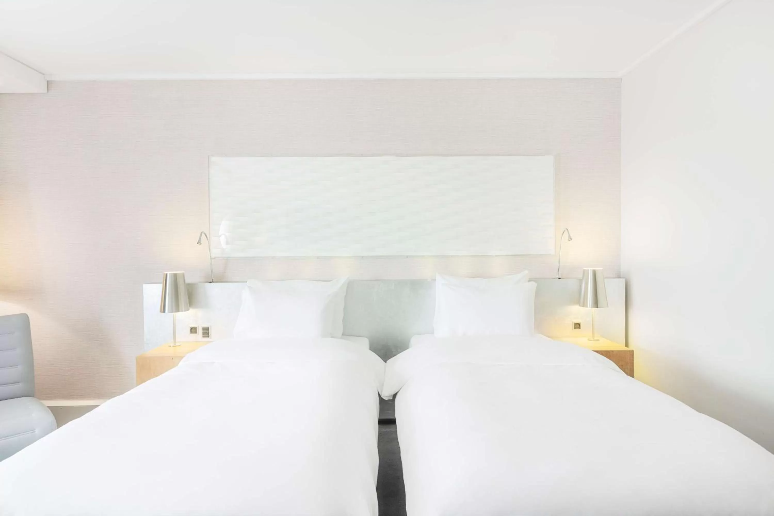 Seating area, Bed in Radisson Blu Scandinavia Hotel Aarhus