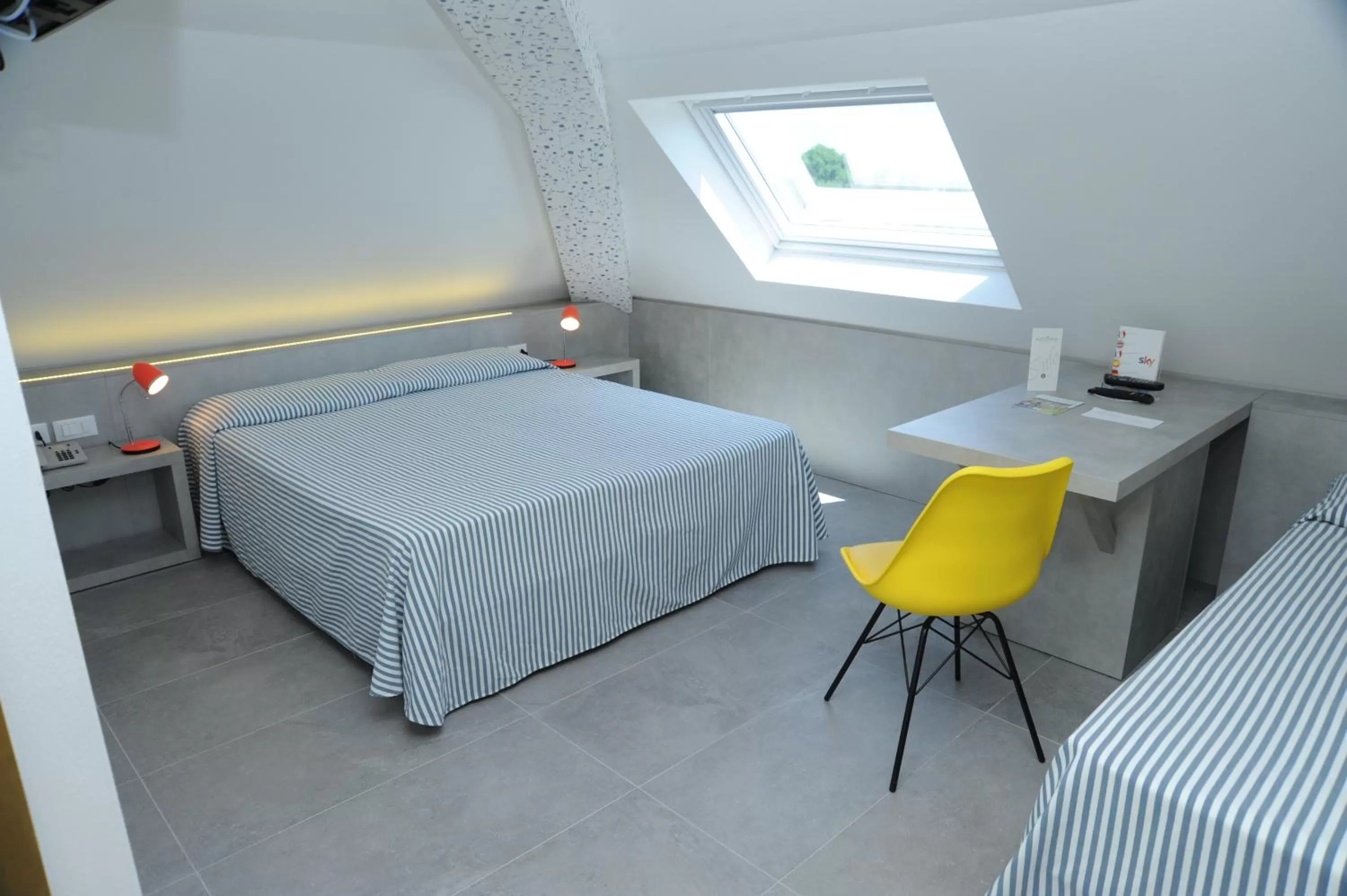 Comfort Quadruple Room in Hotel Astoria